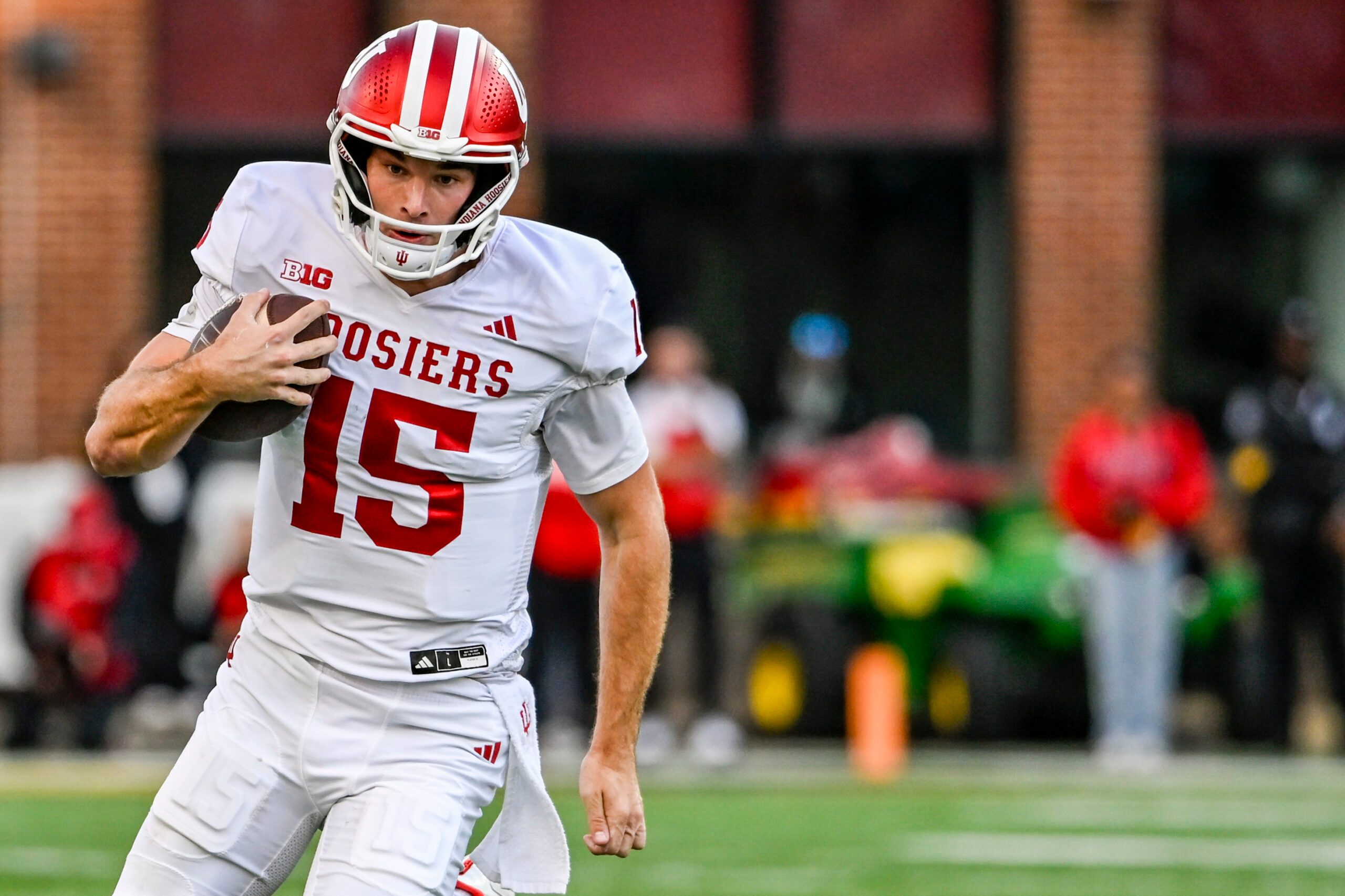 Nov 1, 2025; College Park, Maryland, USA;  Indiana Hoosiers quarterback Fernando Mendoza (15) rushes during the first half against the Maryland Terrapins at SECU Stadium. Mandatory Credit: Tommy Gilligan-Imagn Images