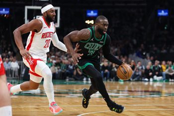 Nov 1, 2025; Boston, Massachusetts, USA; Boston Celtics forward Jaylen Brown (7) drives to the basket during the first half against the Houston Rockets at TD Garden. Mandatory Credit: Paul Rutherford-Imagn Images