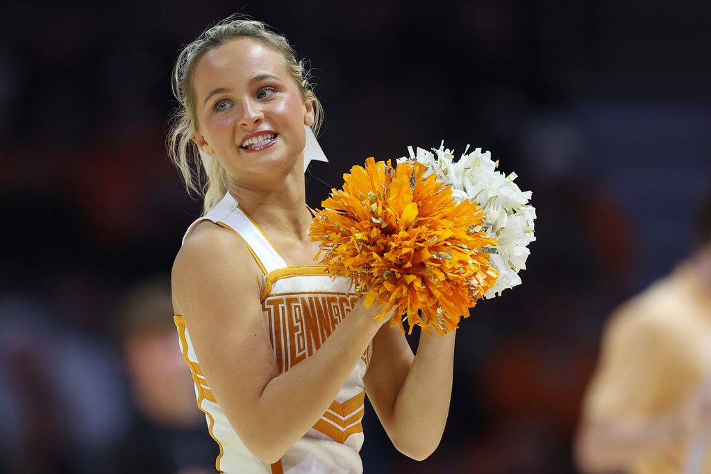 Nov 3, 2025; Knoxville, Tennessee, USA; A Tennessee Volunteers cheerleader performs during the second half against the Mercer Bears at Thompson-Boling Arena at Food City Center. Mandatory Credit: Randy Sartin-Imagn Images