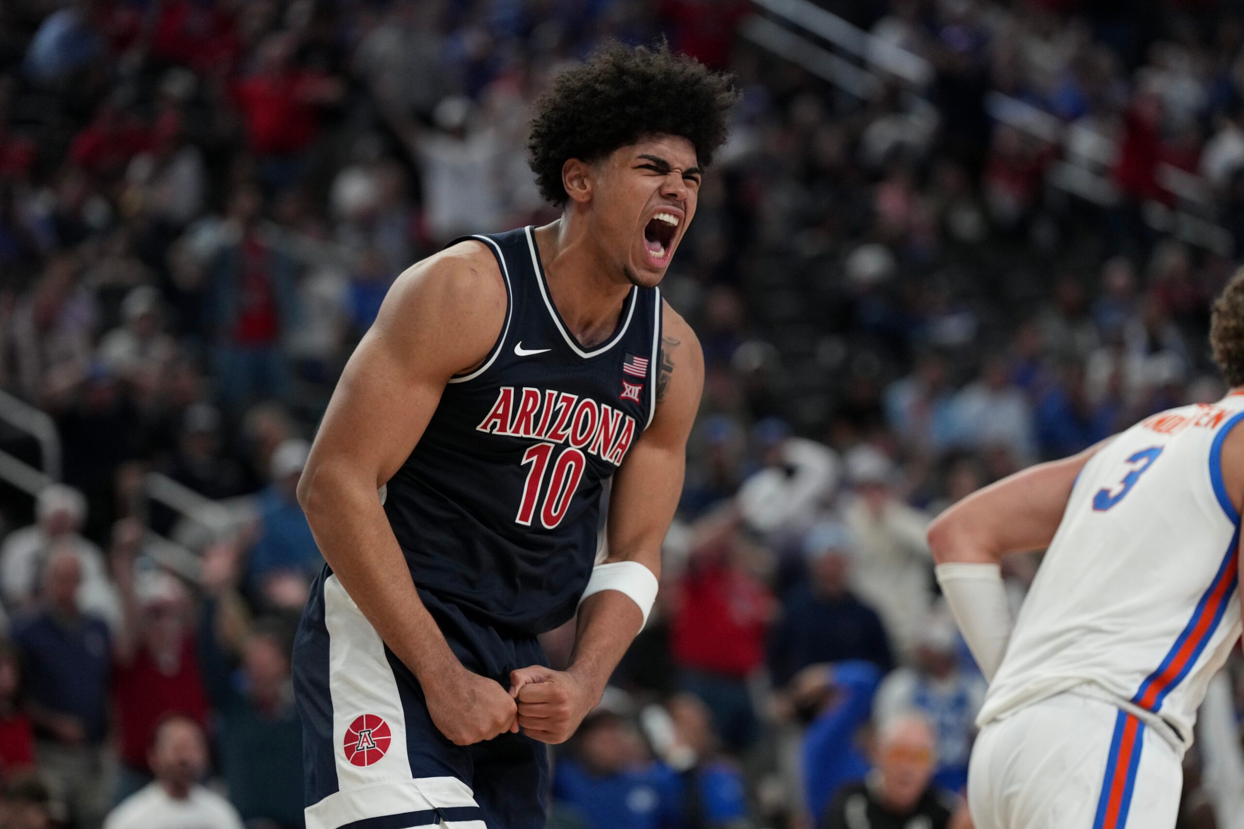 Nov 3, 2025; Las Vegas, NV, USA; Arizona Wildcats forward Koa Peat (10) celebrates a play against the Florida Gators in the second half of the Hall of Fame Series game at T-Mobile Arena. Mandatory Credit: Candice Ward-Imagn Images