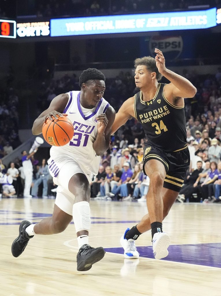 Grand Canyon Antelopes forward Nana Owusu-Anane (31) drives the ball against Purdue Fort Wayne Mastodons forward Darius Duffy (34) on Nov. 3, 2025, at GCU Arena in Phoenix.