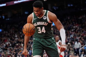 Nov 4, 2025; Toronto, Ontario, CAN; Milwaukee Bucks forward Giannis Antetokounmpo (34) reacts after making a basket against the Toronto Raptors during the first half at Scotiabank Arena. Mandatory Credit: John E. Sokolowski-Imagn Images