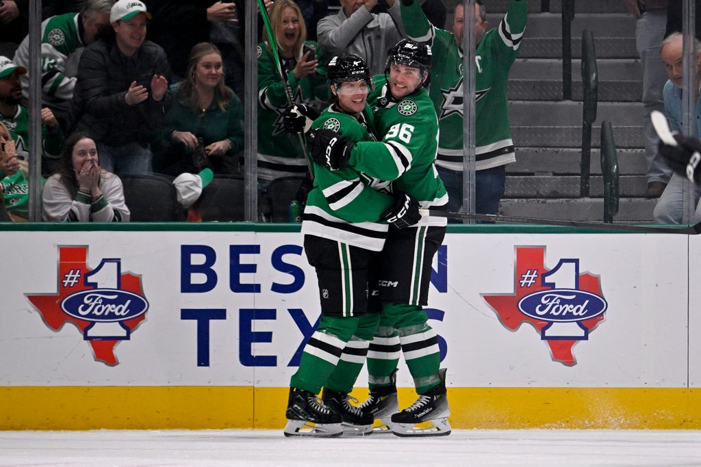 Nov 4, 2025; Dallas, Texas, USA; Dallas Stars defenseman Miro Heiskanen (4) and right wing Mikko Rantanen (96) celebrates the game tying goal scored by Heiskanen against the Edmonton Oilers during the third period at the American Airlines Center. Mandatory Credit: Jerome Miron-Imagn Images