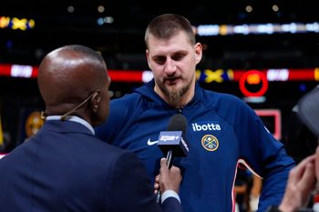 Nov 5, 2025; Denver, Colorado, USA; Denver Nuggets center Nikola Jokic (15) is interviewed following the win against the Miami Heat in the second half at Ball Arena. Mandatory Credit: Ron Chenoy-Imagn Images