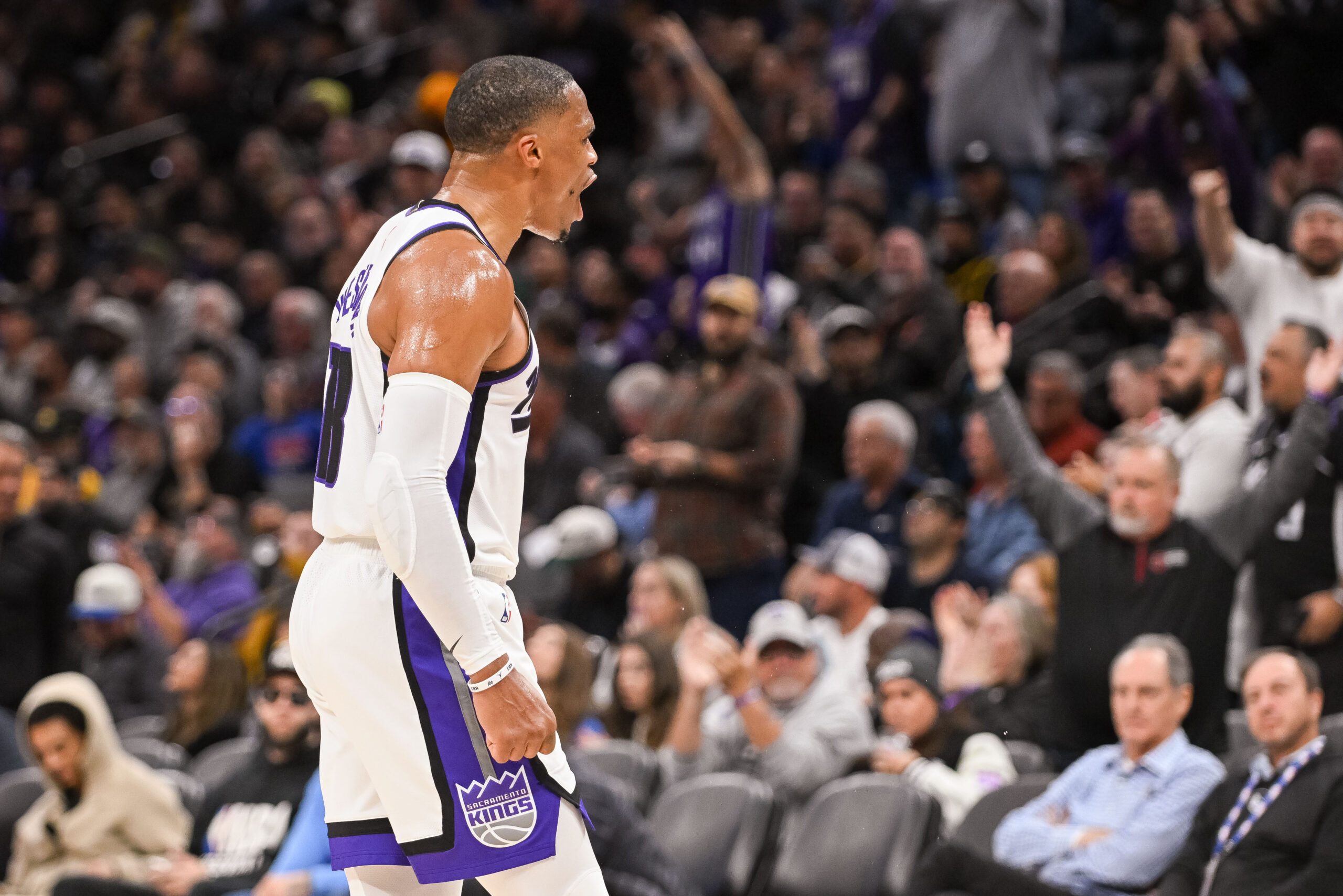 Nov 5, 2025; Sacramento, California, USA; Sacramento Kings guard Russell Westbrook (18) celebrates after scoring against the Golden State Warriors during the third quarter at Golden 1 Center. Mandatory Credit: Ed Szczepanski-Imagn Images