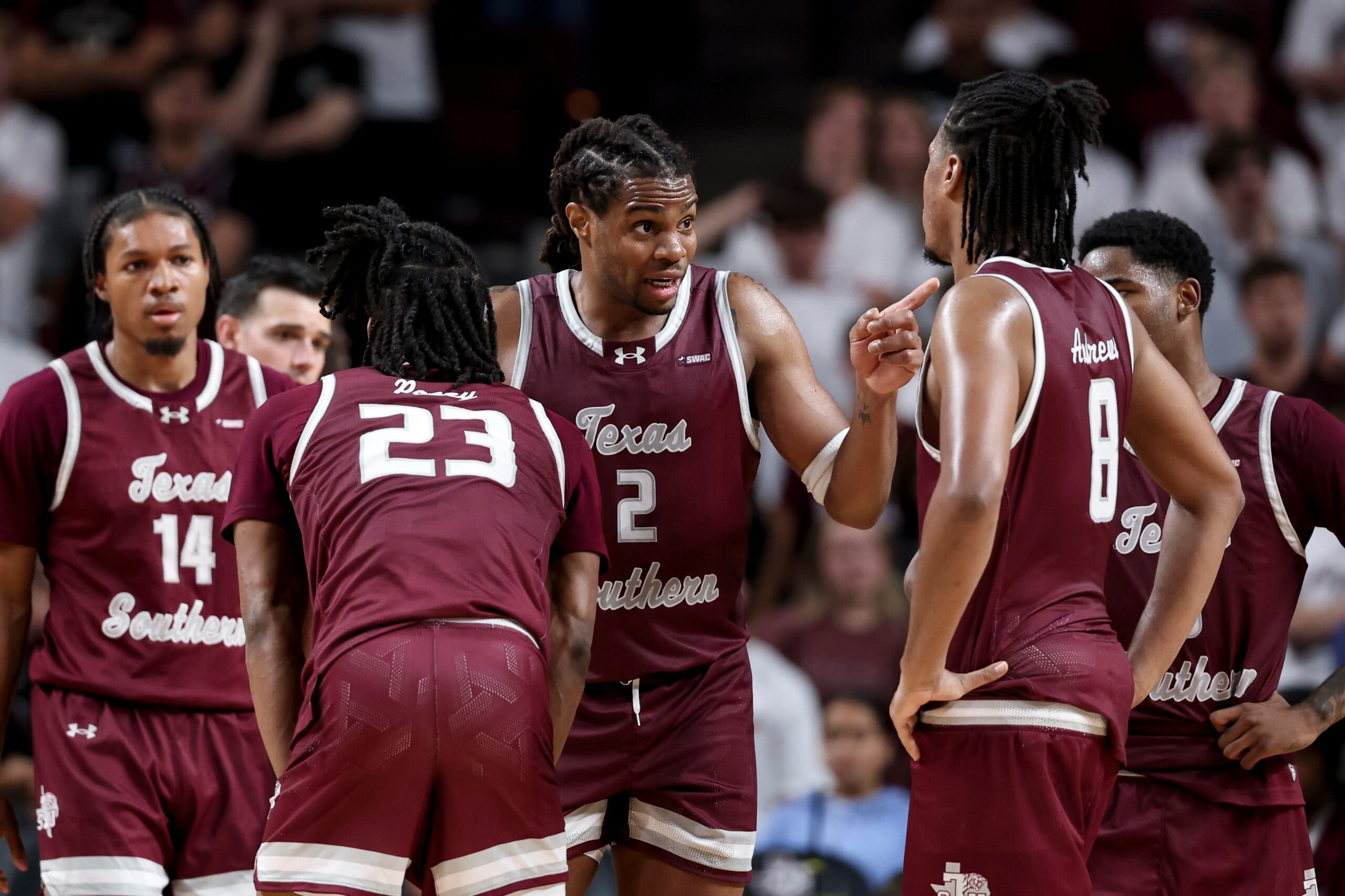 Nov 6, 2025; College Station, Texas, USA; Texas Southern Tigers forward Troy Hupstead (2) and teammates huddle up during a time-out in the during the second half against the Texas A&M Aggies at Reed Arena. Mandatory Credit: Maria Lysaker-Imagn Images