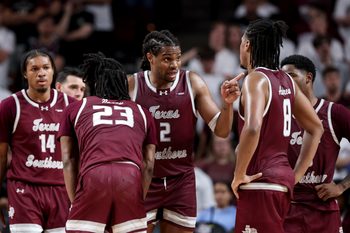 Nov 6, 2025; College Station, Texas, USA; Texas Southern Tigers forward Troy Hupstead (2) and teammates huddle up during a time-out in the during the second half against the Texas A&M Aggies at Reed Arena. Mandatory Credit: Maria Lysaker-Imagn Images