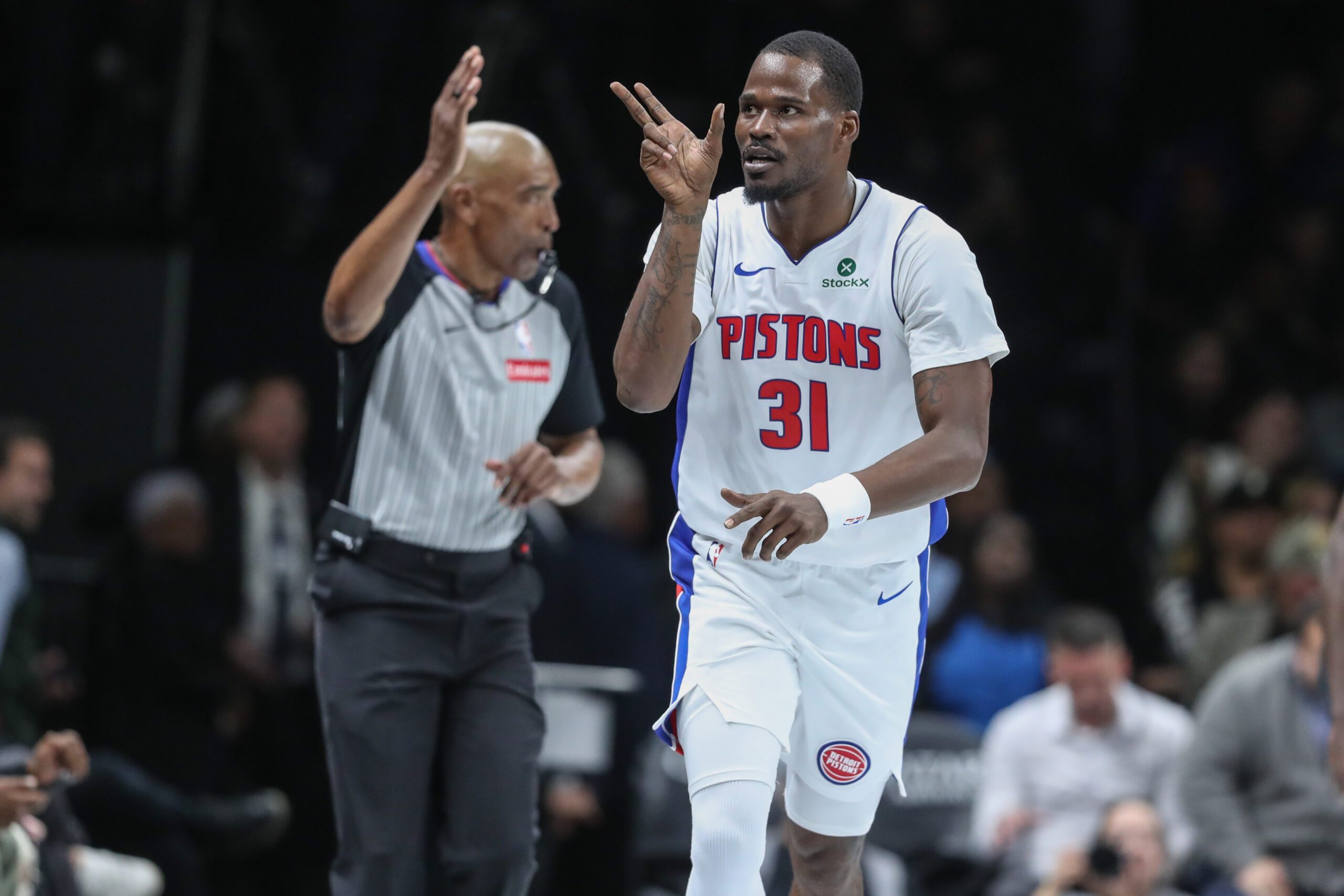 Nov 7, 2025; Brooklyn, New York, USA;  Detroit Pistons guard Javonte Green (31) celebrates after making a three point shot in the fourth quarter against the Brooklyn Nets at Barclays Center. Mandatory Credit: Wendell Cruz-Imagn Images