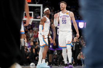Nov 7, 2025; Sacramento, California, USA; Oklahoma City Thunder guard Shai Gilgeous-Alexander (2) meets with center Isiah Hartenstein (55) after a play against the Sacramento Kings in the third quarter at the Golden 1 Center. Mandatory Credit: Cary Edmondson-Imagn Images