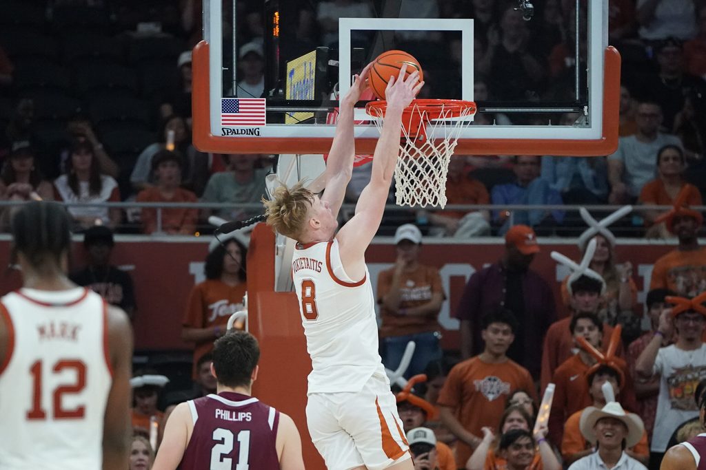 Nov 8, 2025; Austin, Texas, USA; Texas Longhorns center Matas Vokietaitis (8) dunks against the Lafayette Leopards during the second half at Moody Center. Mandatory Credit: Dustin Safranek-Imagn Images