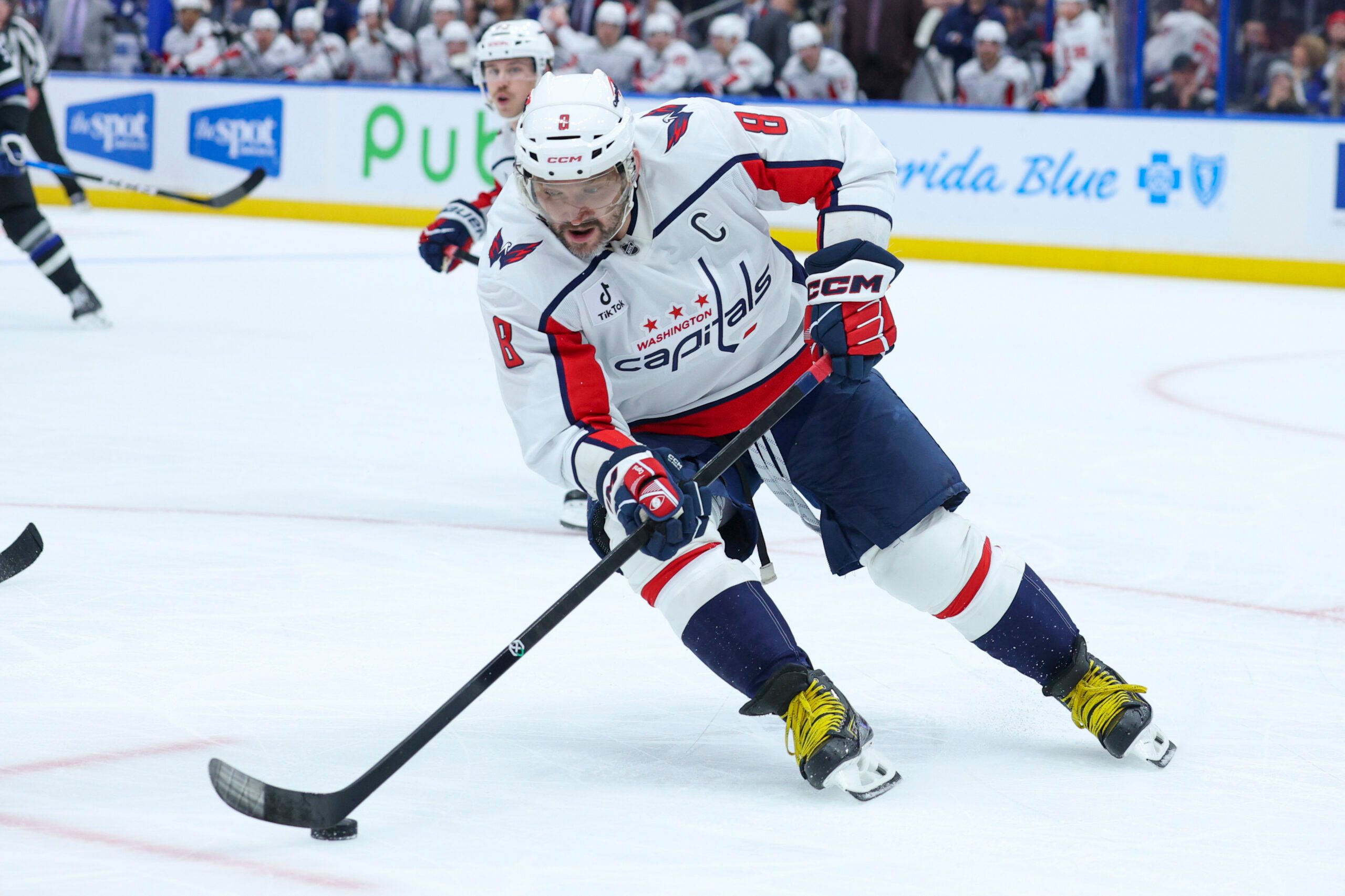Nov 8, 2025; Tampa, Florida, USA; Washington Capitals left wing Alex Ovechkin (8) controls the puck against the Tampa Bay Lightning in the third period at Benchmark International Arena. Mandatory Credit: Nathan Ray Seebeck-Imagn Images