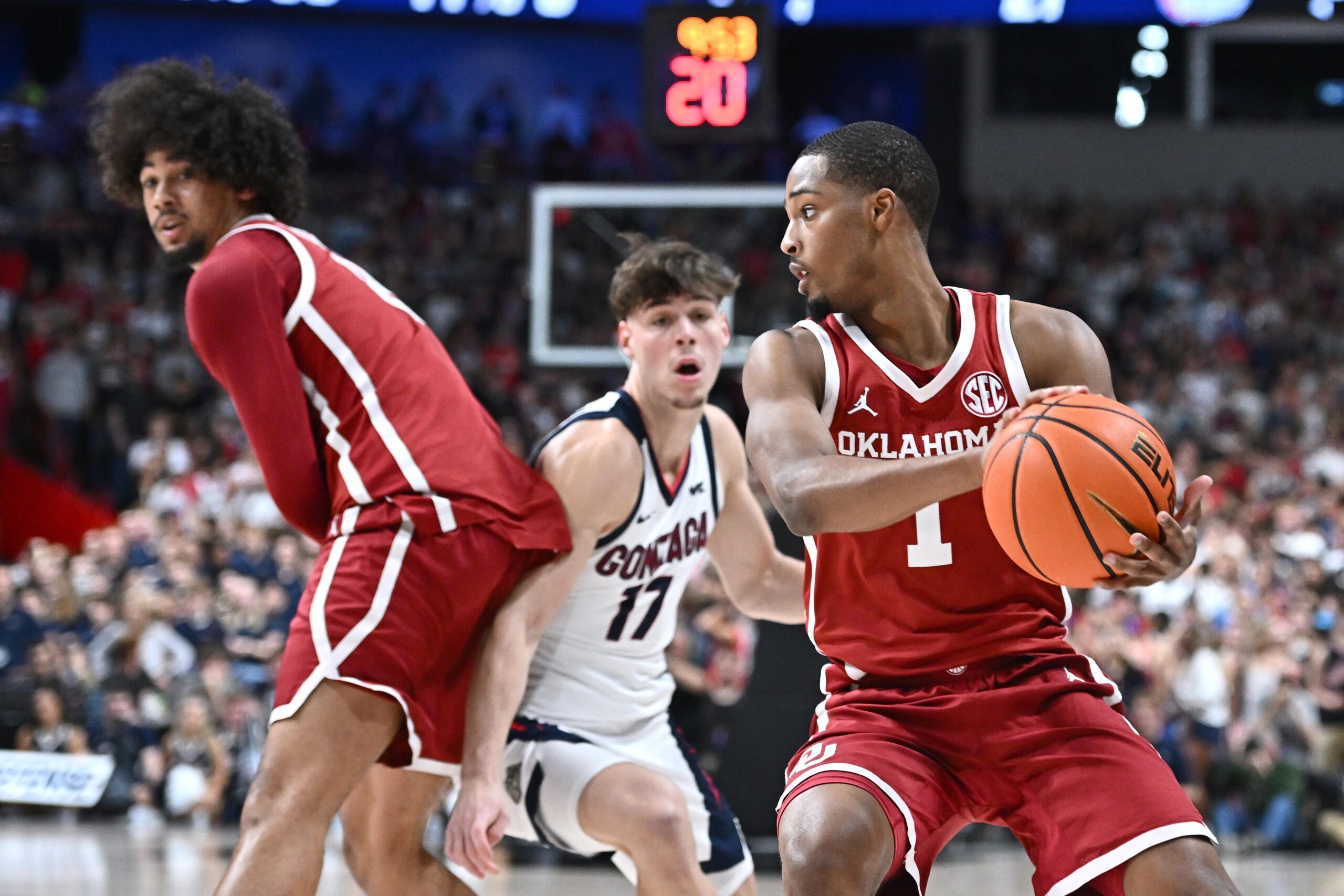 Nov 8, 2025; Spokane, Washington, USA; Oklahoma Sooners guard Xzayvier Brown (1) controls the ball against the Gonzaga Bulldogs in the first half at Numerica Veterans Arena. Mandatory Credit: James Snook-Imagn Images
