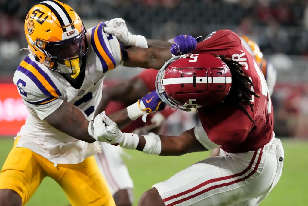 Nov 8, 2025; Tuscaloosa, Alabama, USA; LSU wide receiver Barion Brown (6) blocks Alabama defensive back Dijon Lee Jr. (5) at Saban Field at Bryant-Denny Stadium. Alabama defeated LSU 20-9. Mandatory Credit: Gary Cosby Jr.-Imagn Images