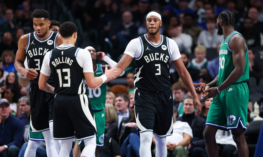 Nov 10, 2025; Dallas, Texas, USA; Milwaukee Bucks center Myles Turner (3) celebrates with Milwaukee Bucks guard Ryan Rollins (13) during the third quarter against the Dallas Mavericks at American Airlines Center. Mandatory Credit: Kevin Jairaj-Imagn Images