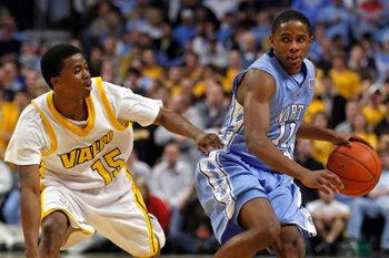 Dec 20, 2008; Chicago, IL, USA; North Carolina Tar Heels guard Larry Drew II (11) brings the ball up the court against Valparaiso Crusaders guard Erik Buggs (15) during the first half at the United Center. Mandatory Credit: Jerry Lai-Imagn Images