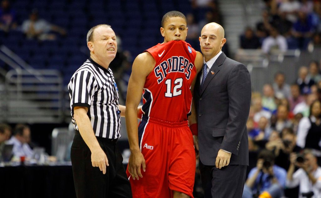 Mar 25, 2011; San Antonio, TX, USA; Richmond Spiders forward Kevin Smith (12) react after talking with a referee during the semifinals of the southwest regional of the 2011 NCAA men's basketball tournament against the Kansas Jayhawks at the Alamodome. Mandatory Credit: Bob Donnan-Imagn Images