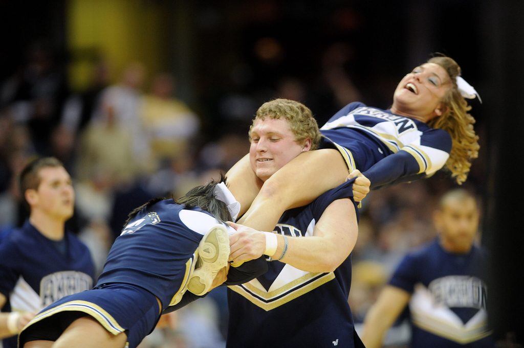 Mar 16, 2013; Cleveland, OH, USA; Akron Zips cheerleaders perform during the championship game against the Ohio Bobcats in the MAC tournament at Quicken Loans Arena. Mandatory Credit: Eric P. Mull-Imagn Images