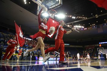 Mar 16, 2014; New Orleans, LA, USA; Louisiana Lafayette Ragin Cajuns cheerleaders lead the team onto the court prior to tipoff against the Georgia State Panthers in the championship game of the Sun Belt Conference college basketball tournament at Lakefront Arena. Louisiana Lafayette defeated Georgia State 82-81. Mandatory Credit: Crystal LoGiudice-Imagn Images