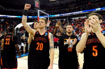 Mar 23, 2014; Raleigh, NC, USA; Mercer Bears guard Ike Nwamu (10) recognizes the fans after loosing to the Tennessee Volunteers in a men's college basketball game during the third round of the 2014 NCAA Tournament at PNC Arena. Mandatory Credit: Bob Donnan-Imagn Images