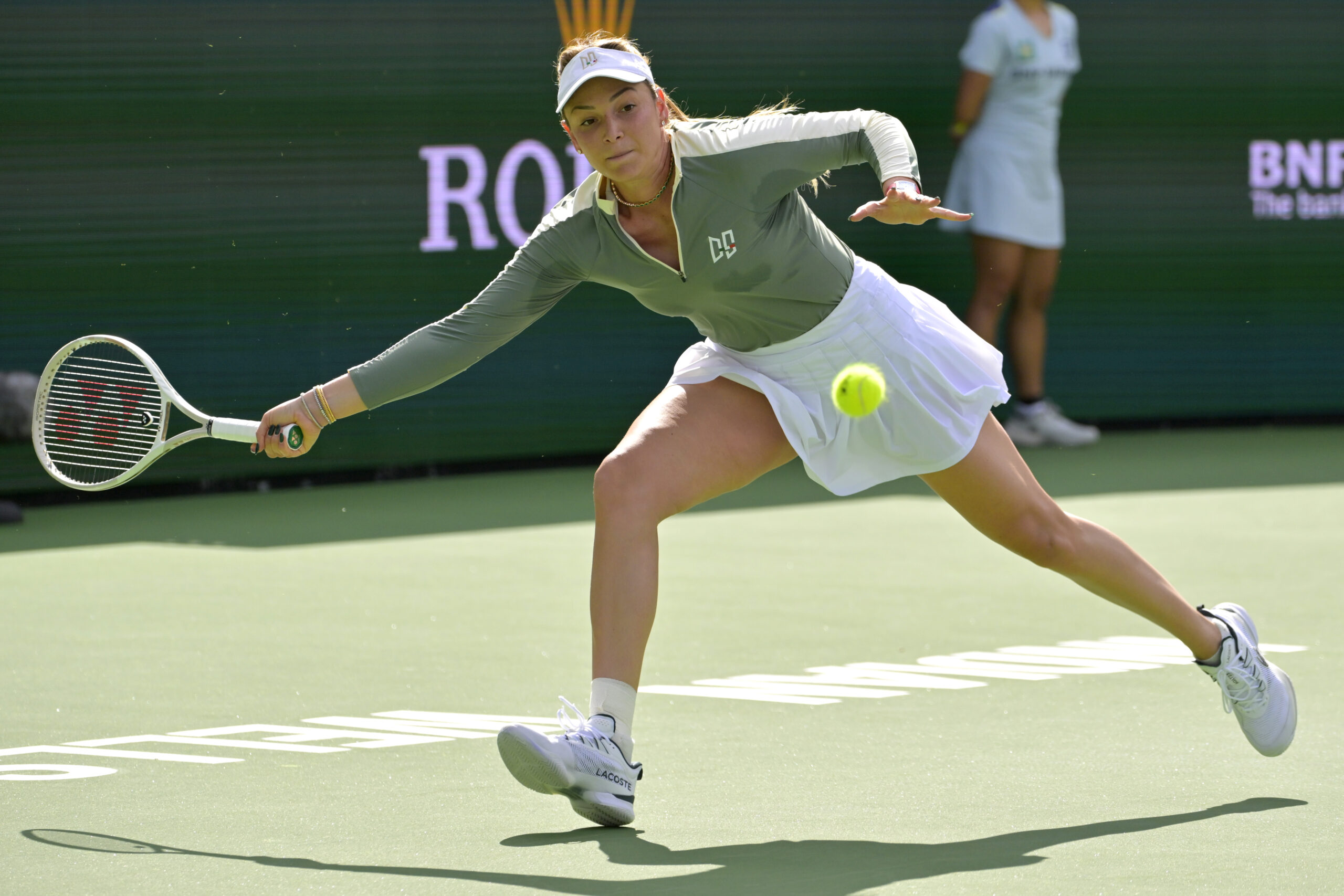 Mar 12, 2025; Indian Wells, CA, USA; Donna Vekic (CRO) hits a shot against Madison Keys (not pictured) in round four of the BNP Paribas Open at the Indian Well Tennis Garden. Mandatory Credit: Jayne Kamin-Oncea-Imagn Images