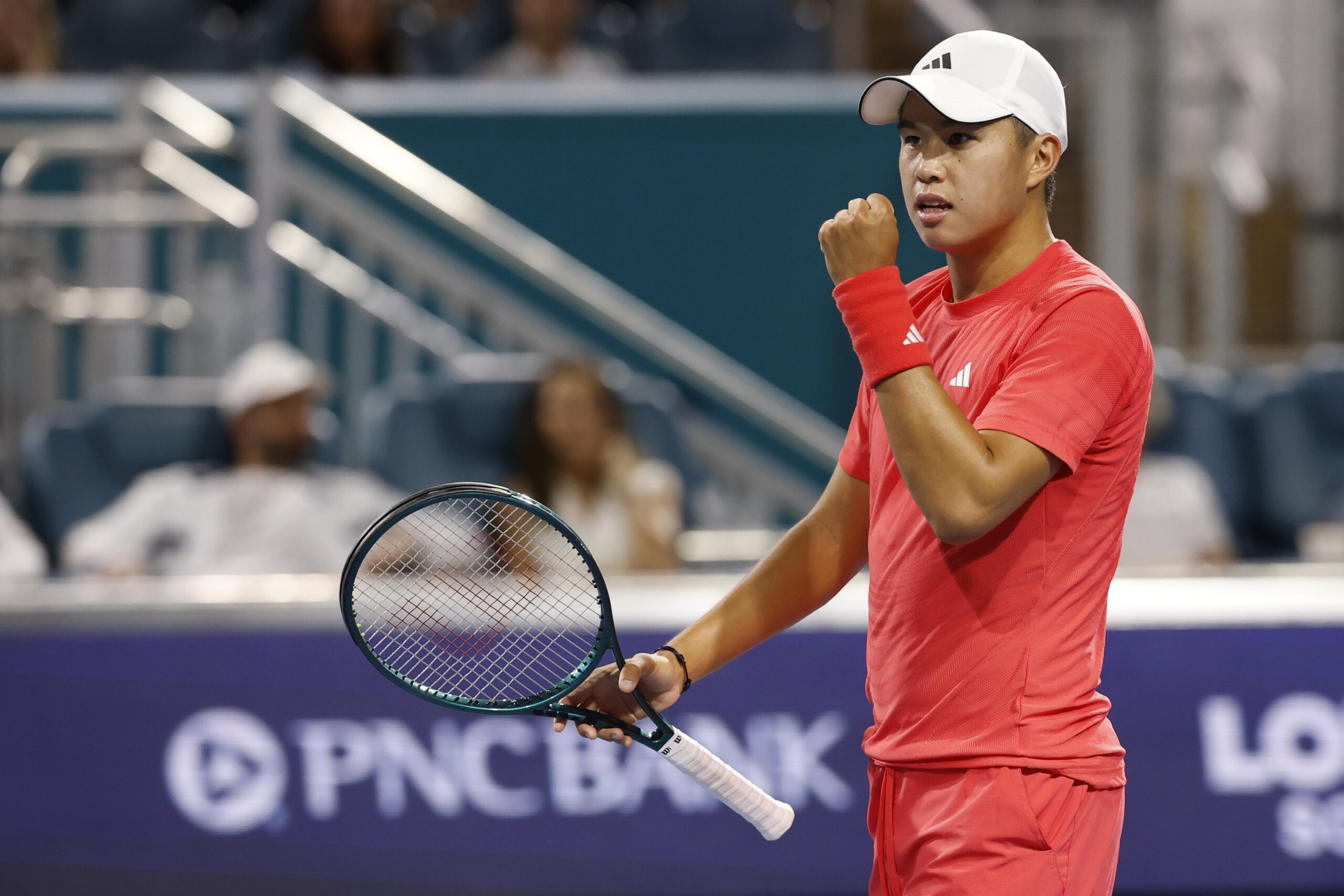 Mar 20, 2025; Miami, FL, USA; Learner Tien (USA) reacts after winning the first set tie-breaker against Joao Fonseca (BRA)(not pictured) on day three of the Miami Open at Hard Rock Stadium. Mandatory Credit: Geoff Burke-Imagn Images