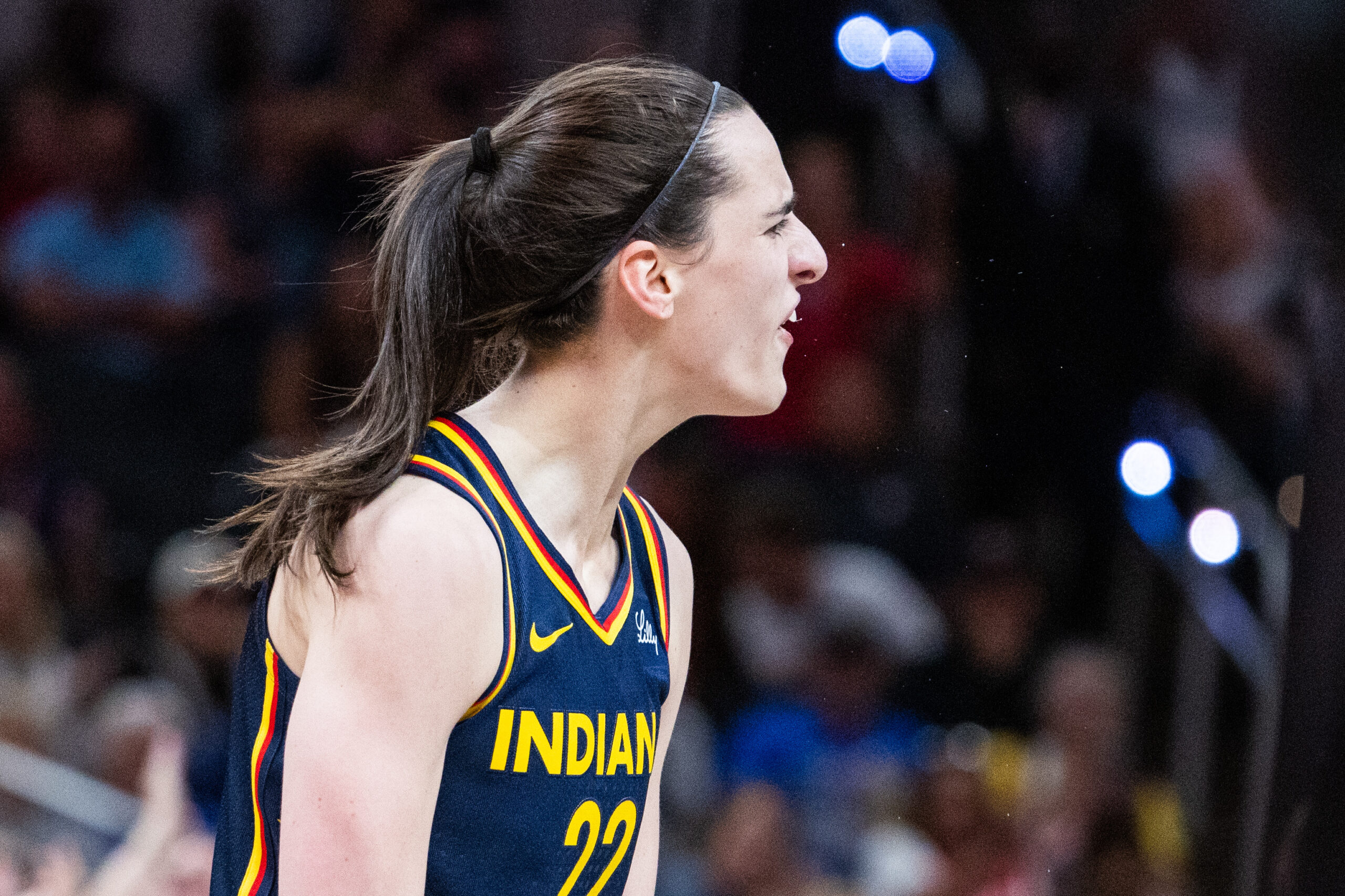 Jun 17, 2025; Indianapolis, Indiana, USA; Indiana Fever guard Caitlin Clark (22) celebrates in the second half against the Connecticut Sun at Gainbridge Fieldhouse. Mandatory Credit: Trevor Ruszkowski-Imagn Images