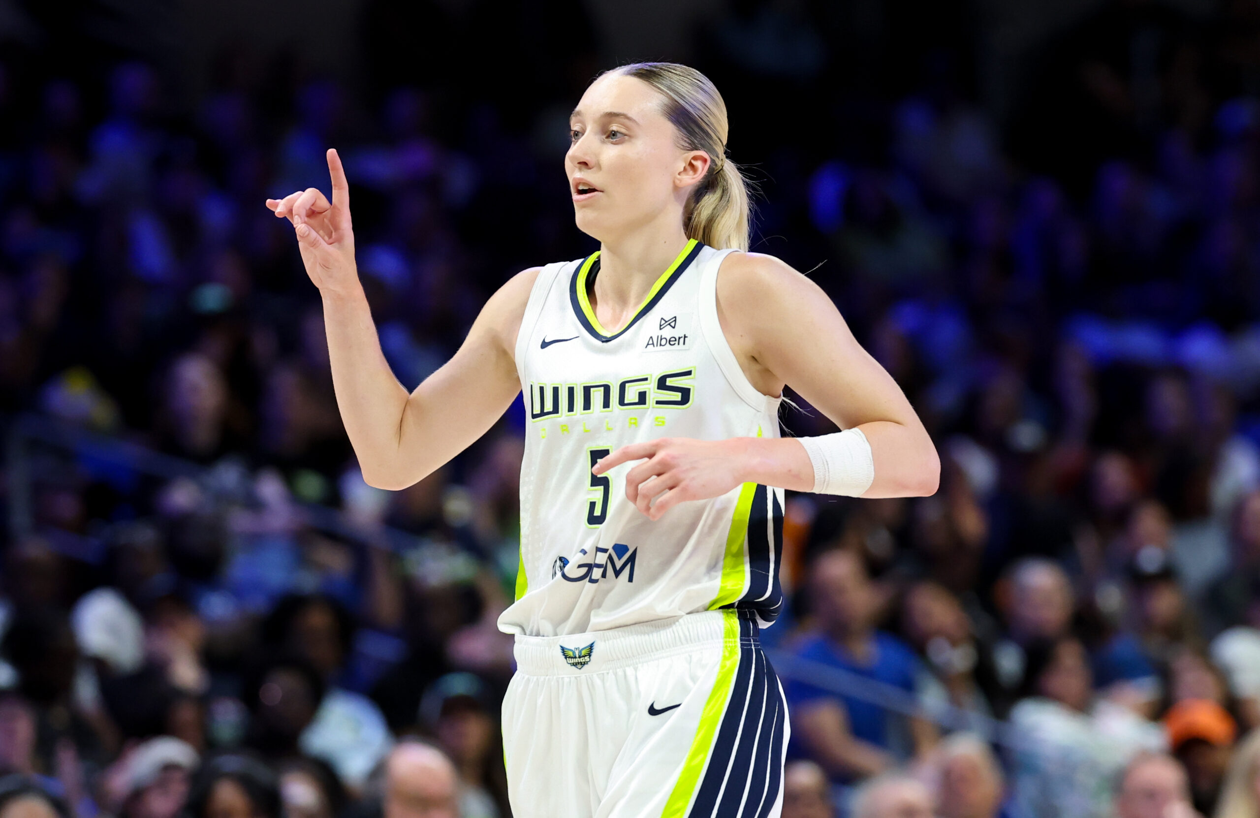 Jun 17, 2025; Arlington, Texas, USA; Dallas Wings guard Paige Bueckers (5) reacts during the second half against the Golden State Valkyries at College Park Center. Mandatory Credit: Kevin Jairaj-Imagn Images