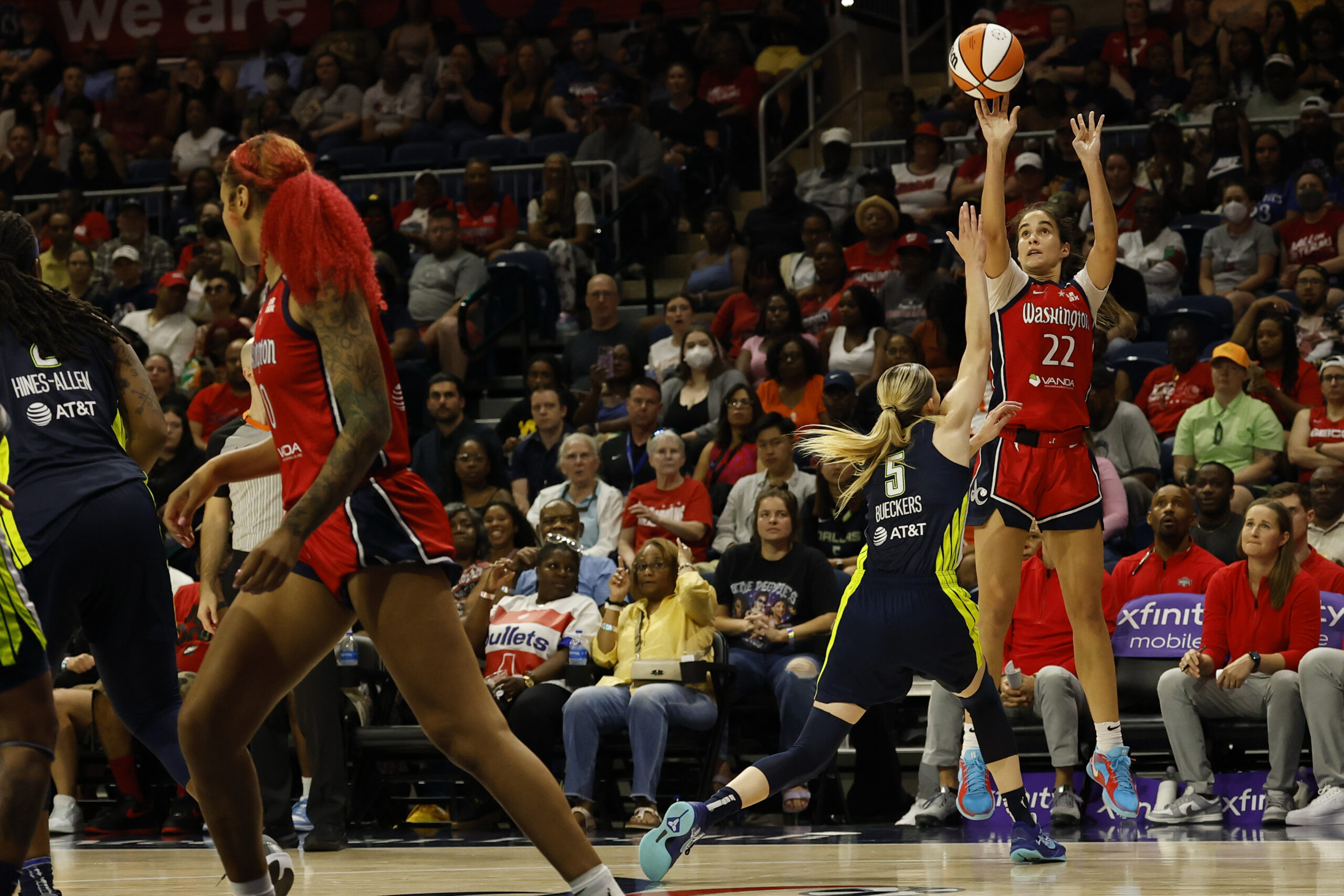 Jun 22, 2025; Washington, District of Columbia, USA; Washington Mystics guard Sonia Citron (22) shoots the ball over Dallas Wings guard Paige Bueckers (5) in the second half at Entertainment & Sports Arena. Mandatory Credit: Geoff Burke-Imagn Images