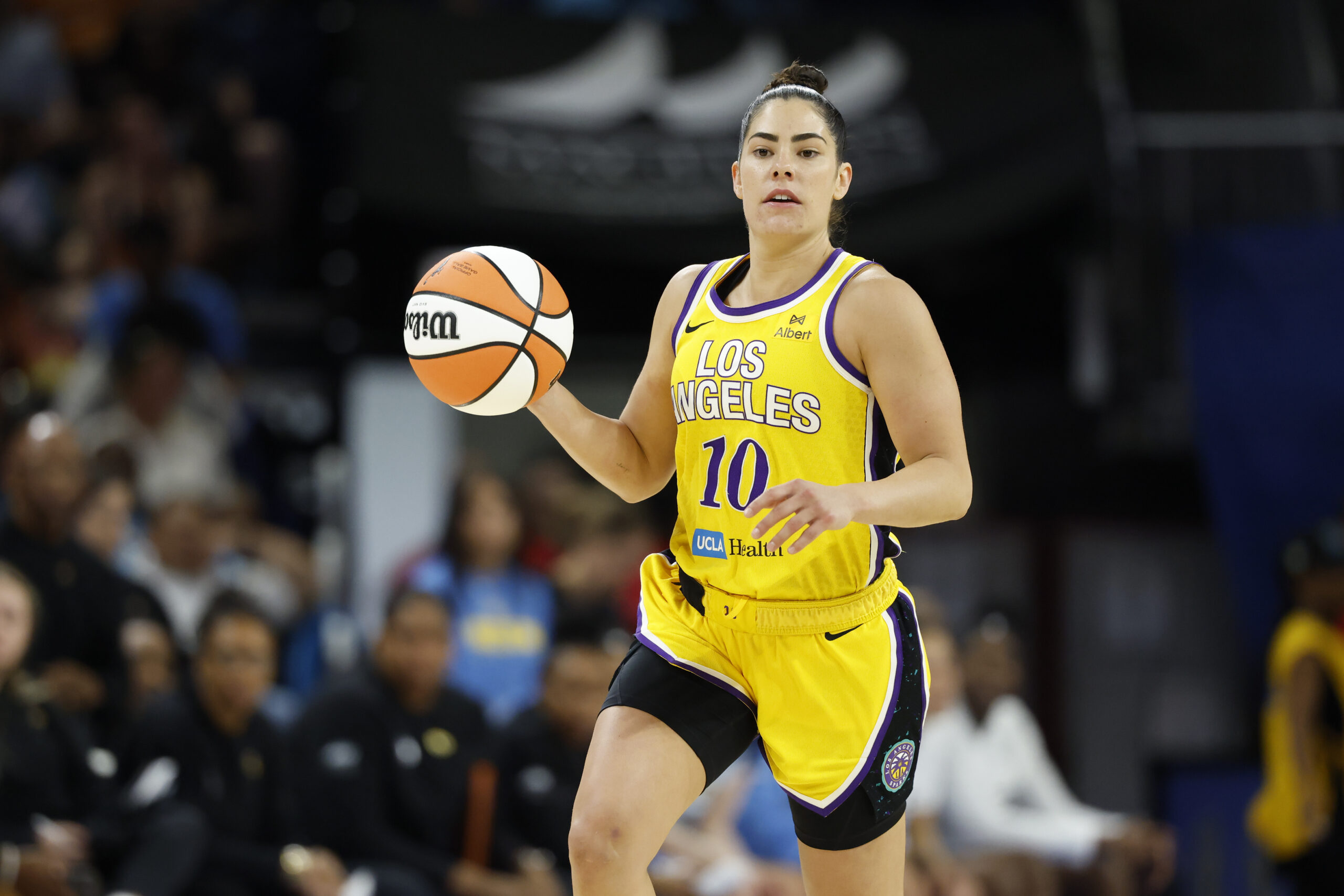 Jun 24, 2025; Chicago, Illinois, USA; Los Angeles Sparks guard Kelsey Plum (10) brings the ball up court against the Chicago Sky during the second half at Wintrust Arena. Mandatory Credit: Kamil Krzaczynski-Imagn Images