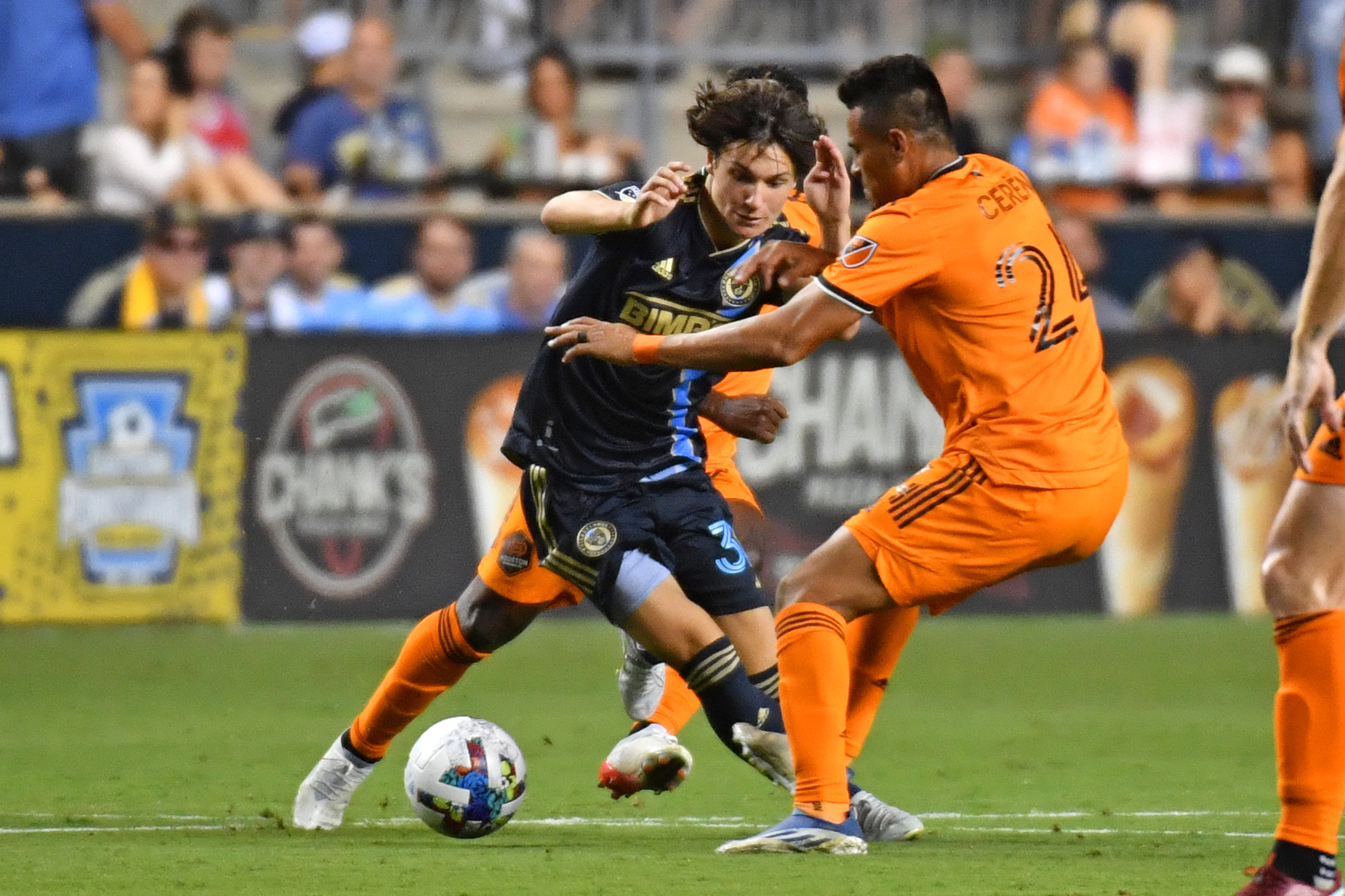 Jul 30, 2022; Chester, Pennsylvania, USA; Philadelphia Union midfielder Paxten Aaronson (30) is defended by Houston Dynamo midfielder Darwin Cer n (24) during the second half at Subaru Park. Mandatory Credit: Eric Hartline-Imagn Images