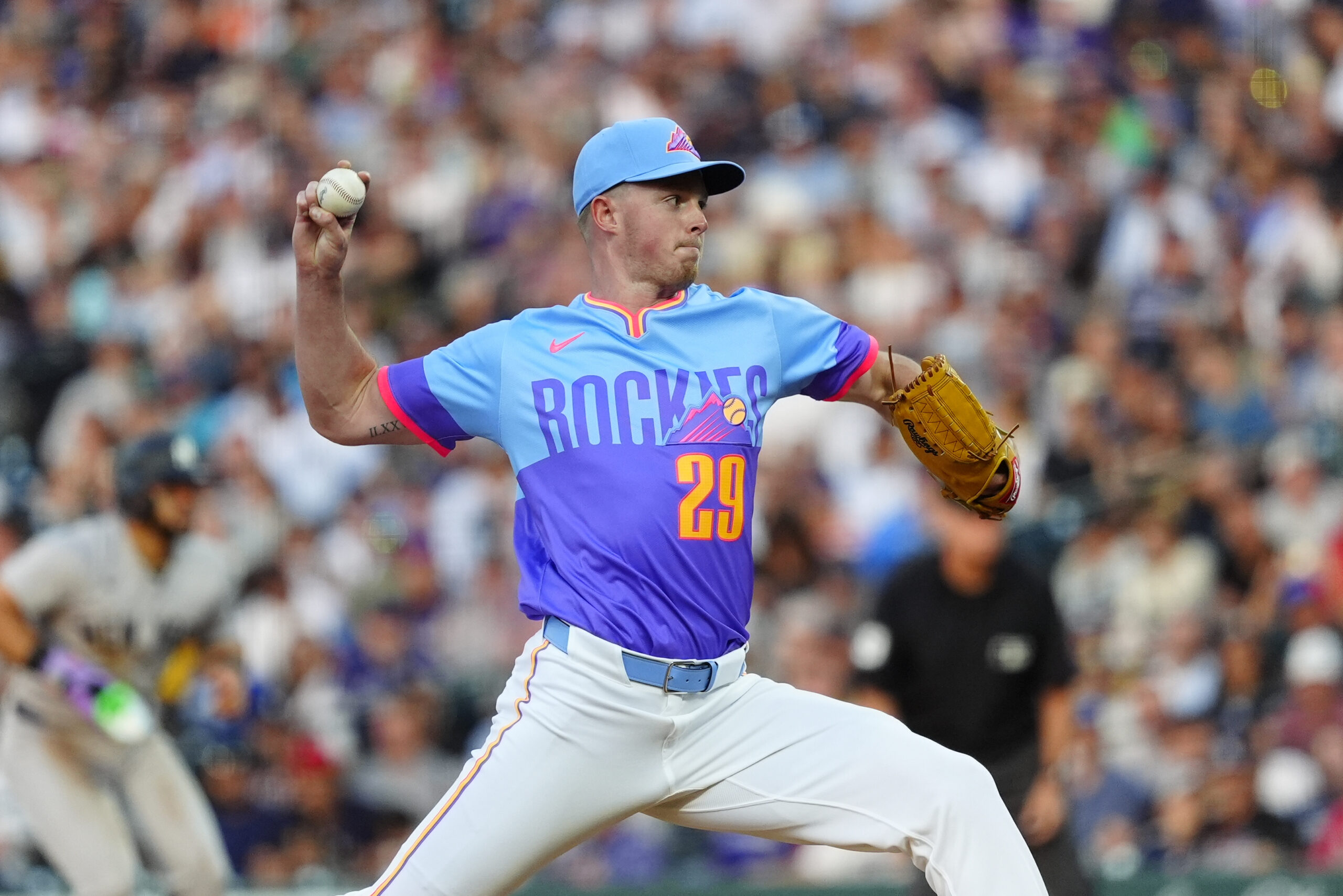 May 23, 2025; Denver, Colorado, USA; Colorado Rockies starting pitcher Tanner Gordon (29) delivers a pitch in the fourth inning against the New York Yankees at Coors Field. Mandatory Credit: Ron Chenoy-Imagn Images