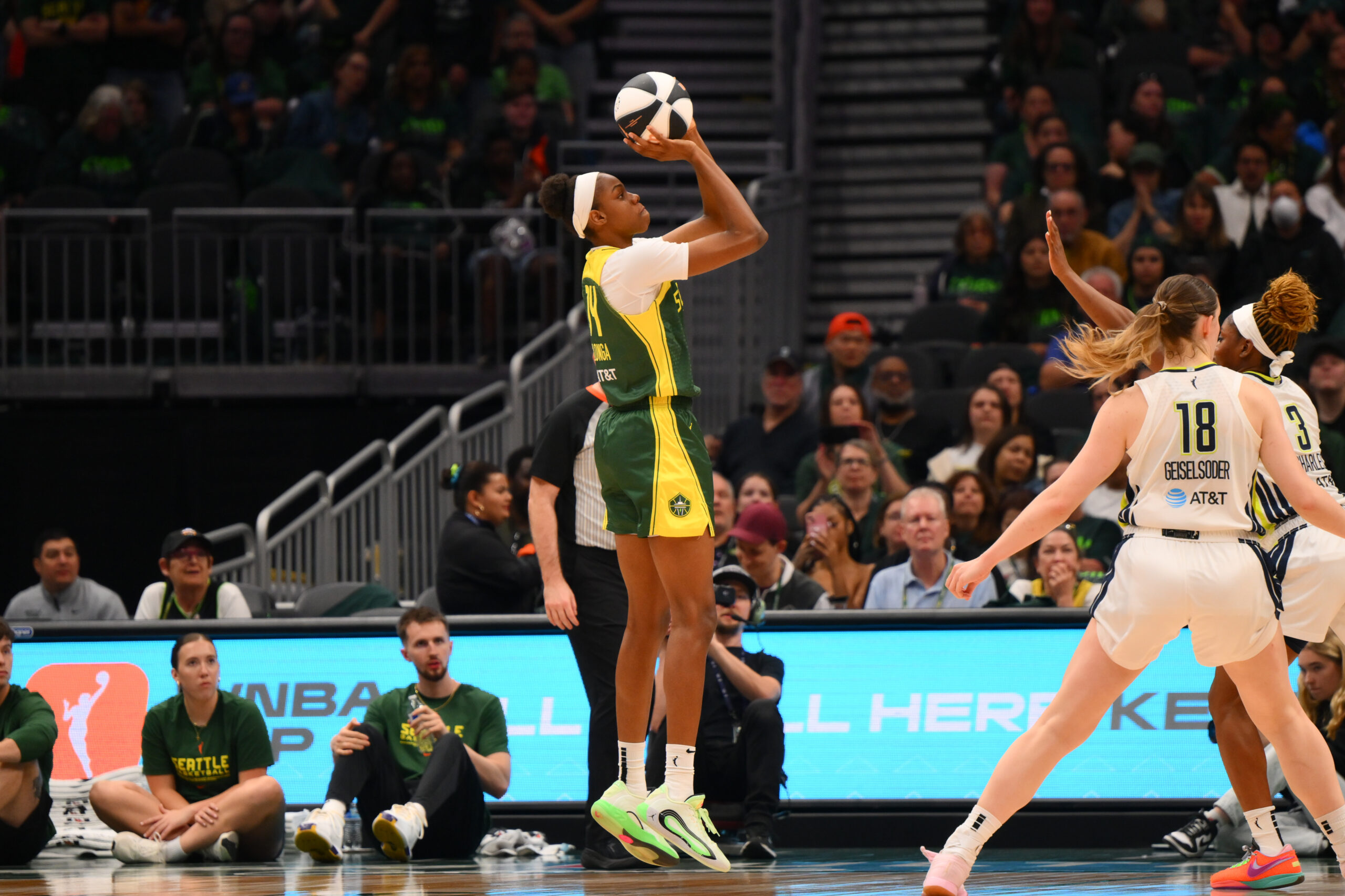 Jun 3, 2025; Seattle, Washington, USA; Seattle Storm center Dominique Malonga (14) shoots the ball against the Dallas Wings during the second half at Climate Pledge Arena. Mandatory Credit: Steven Bisig-Imagn Images