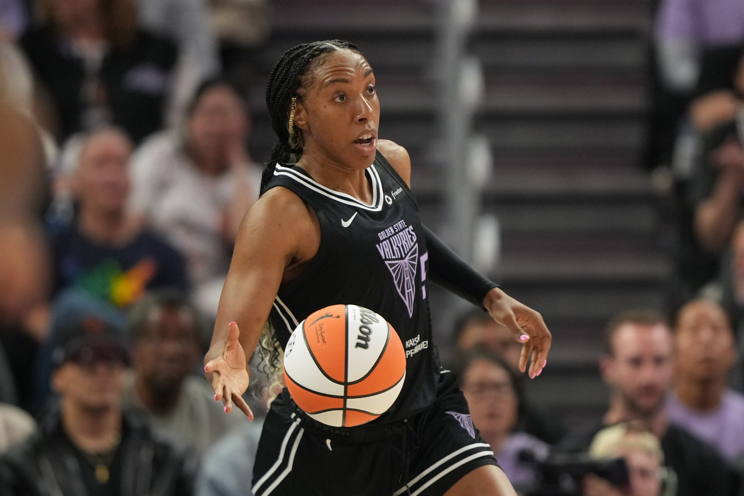 Jun 29, 2025; San Francisco, California, USA; Golden State Valkyries forward Kayla Thornton (5) dribbles against the Seattle Storm during the second quarter at Chase Center. Mandatory Credit: Darren Yamashita-Imagn Images