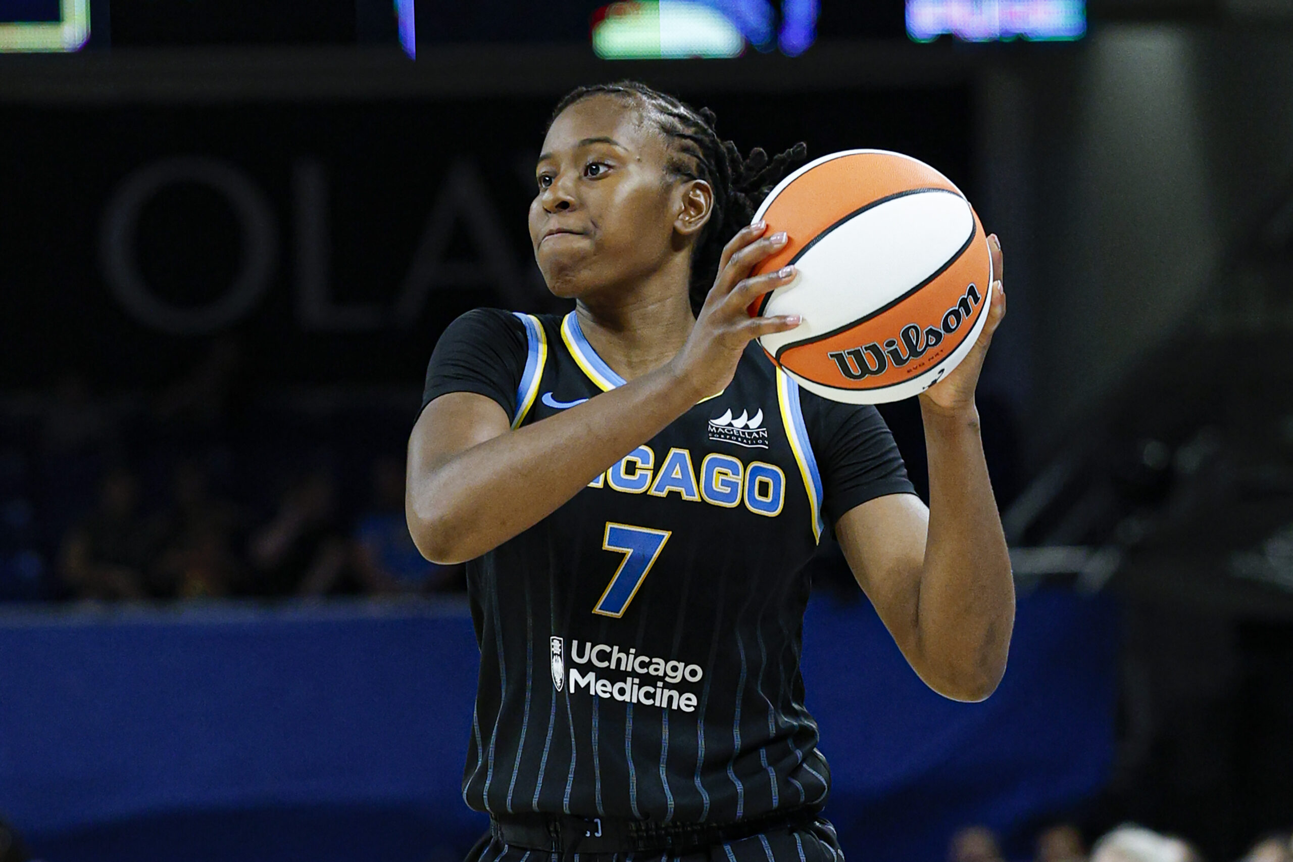 Jul 12, 2025; Chicago, Illinois, USA; Chicago Sky guard Ariel Atkins (7) looks to pass the ball against the Minnesota Lynx during the second half of a WNBA game at Wintrust Arena. Mandatory Credit: Kamil Krzaczynski-Imagn Images