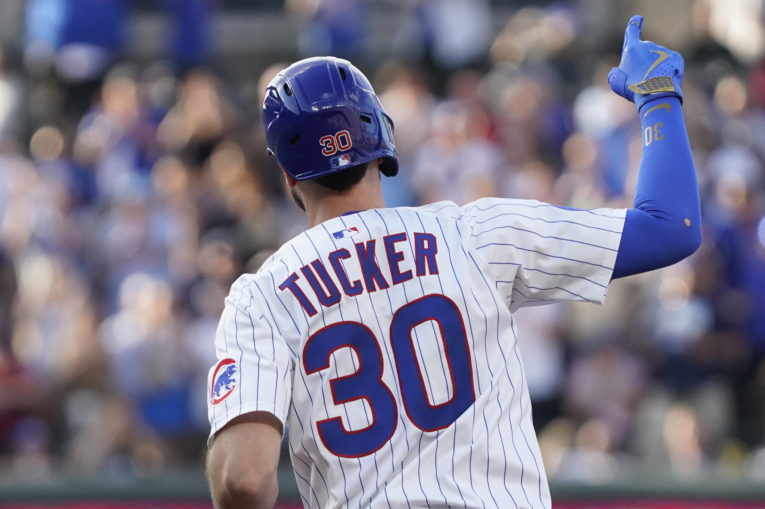 Jul 19, 2025; Chicago, Illinois, USA; Chicago Cubs outfielder Kyle Tucker (30) gestures after hitting a home run against the Boston Red Sox during the first inning at Wrigley Field. Mandatory Credit: David Banks-Imagn Images