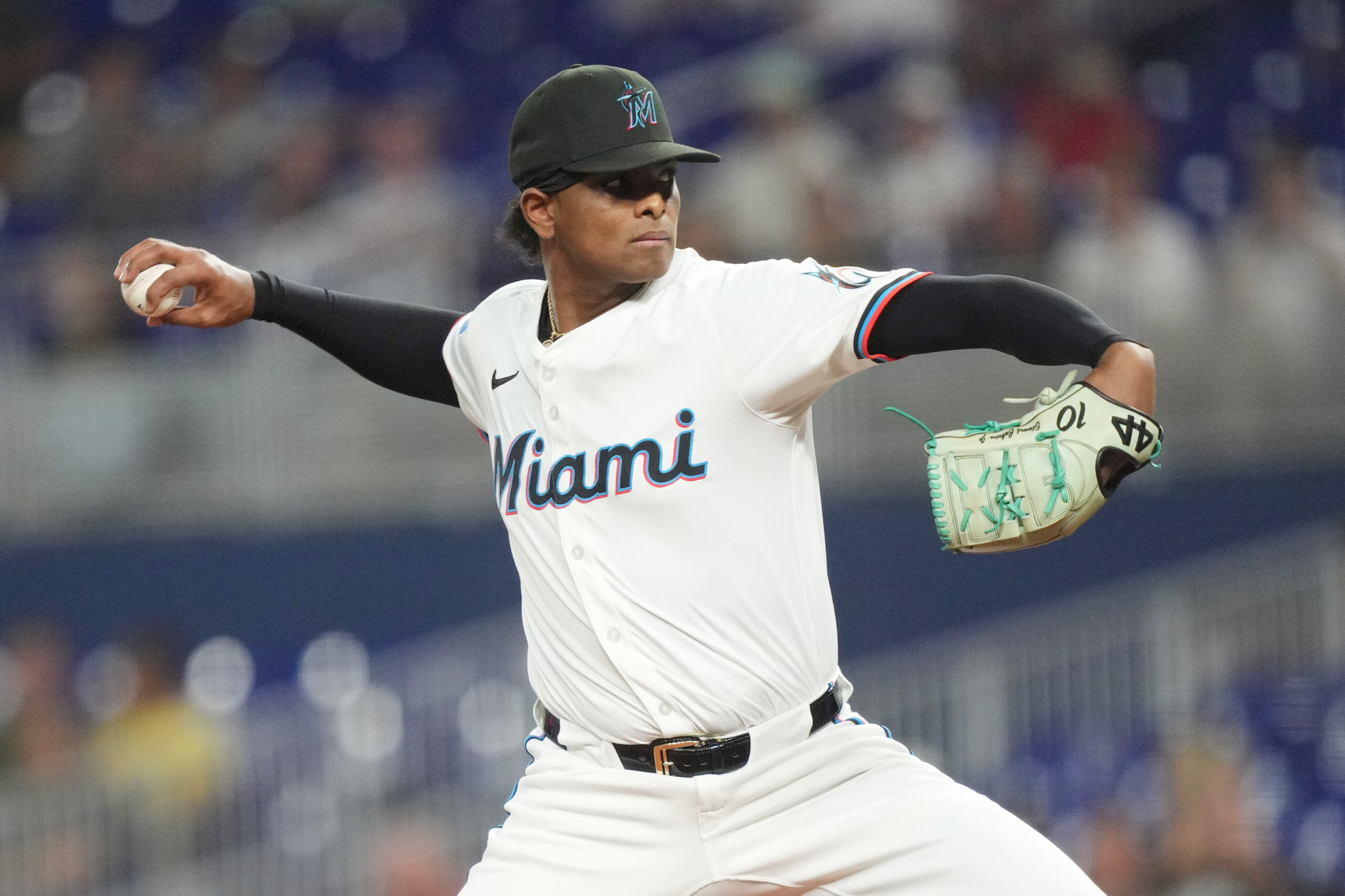 Jul 22, 2025; Miami, Florida, USA;  Miami Marlins pitcher Edward Cabrera (27) pitches in the first inning against the San Diego Padres at loanDepot Park. Mandatory Credit: Jim Rassol-Imagn Images