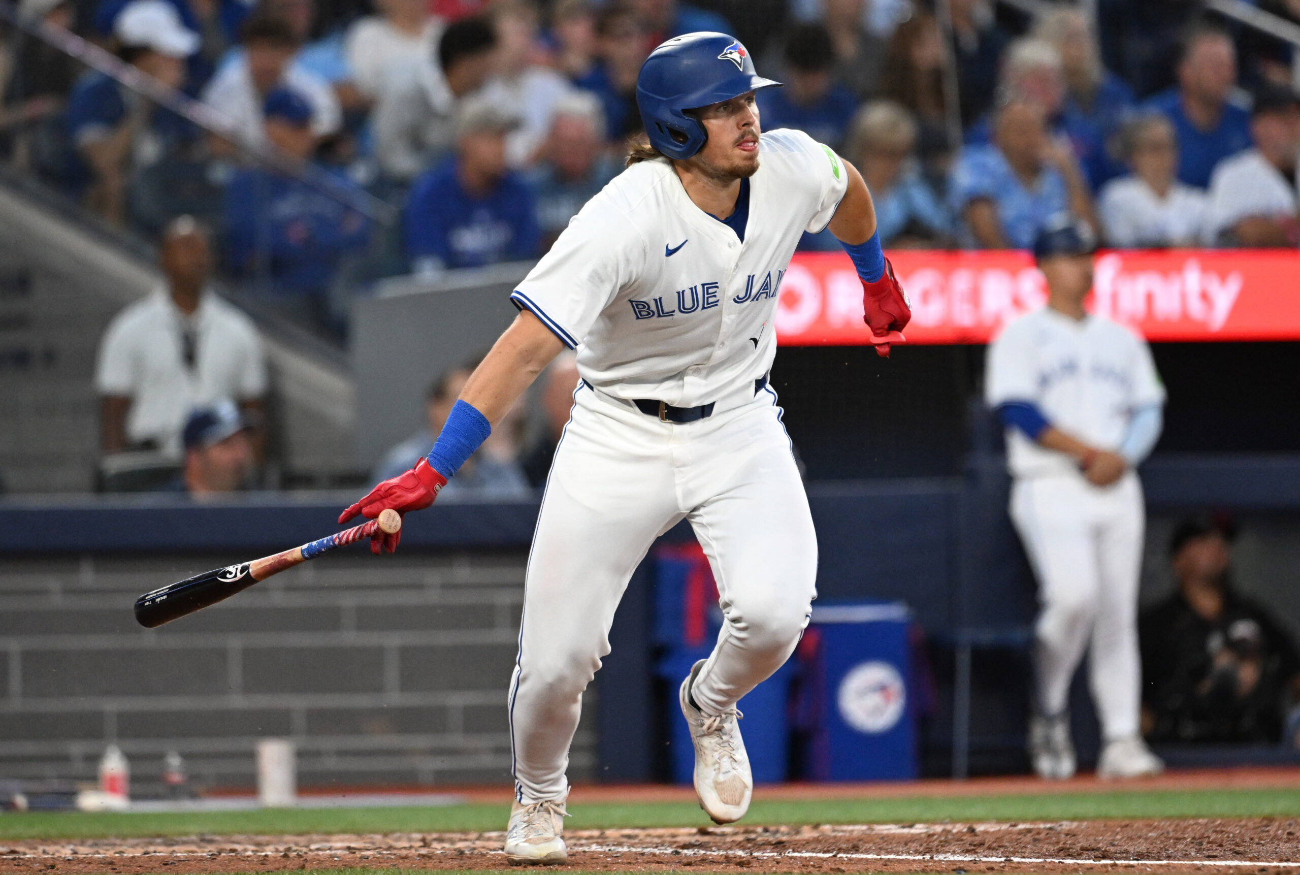 Jul 22, 2025; Toronto, Ontario, CAN; Toronto Blue Jays right fielder Addison Barger (47) hits an RBI single against the New York Yankees in the fifth inning at Rogers Centre. Mandatory Credit: Dan Hamilton-Imagn Images