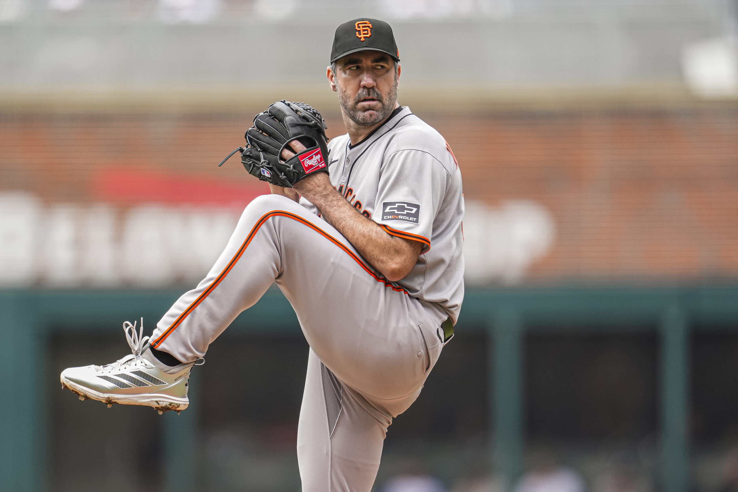 Jul 23, 2025; Cumberland, Georgia, USA; San Francisco Giants starting pitcher Justin Verlander (35) pitches against the Atlanta Braves during the first inning at Truist Park. Mandatory Credit: Dale Zanine-Imagn Images