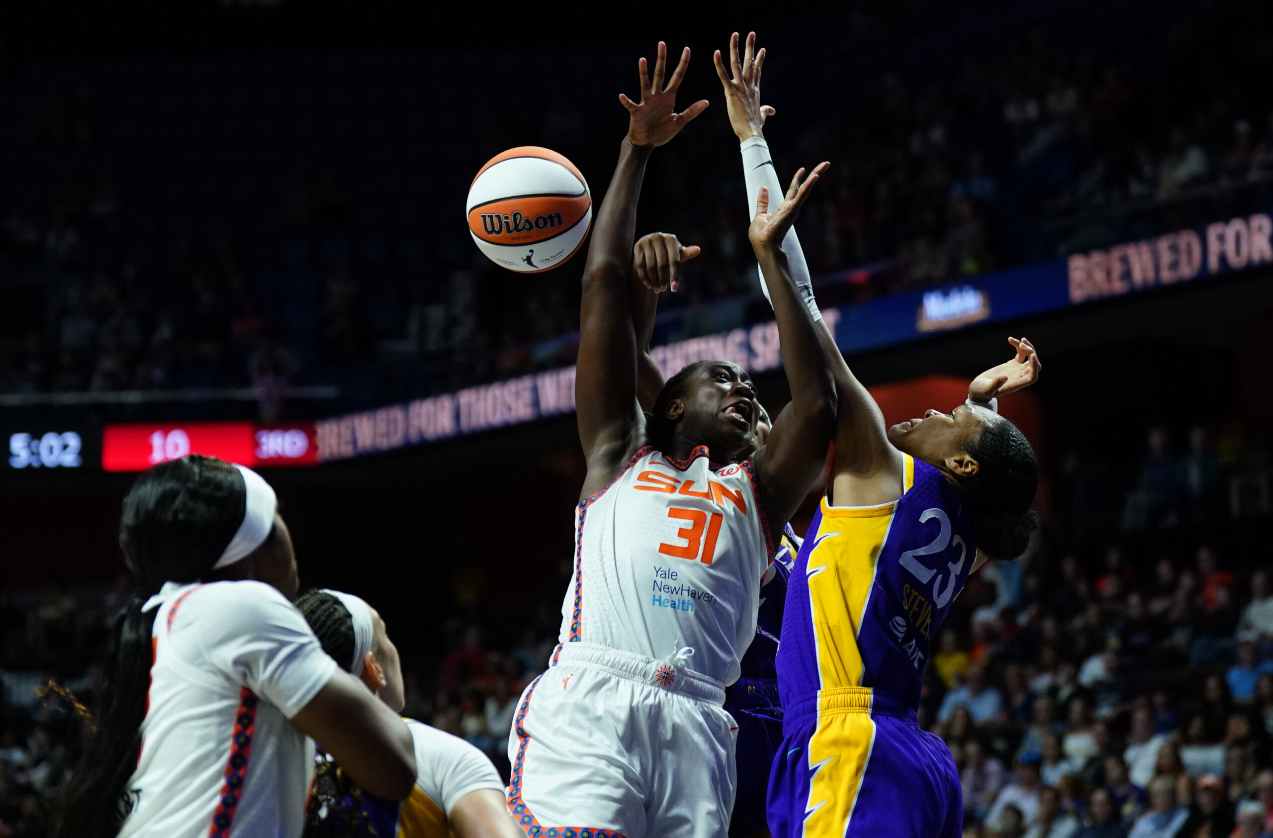Jul 24, 2025; Uncasville, Connecticut, USA; Los Angeles Sparks forward Azura Stevens (23) defends against Connecticut Sun center Tina Charles (31) in the second half at Mohegan Sun Arena. Mandatory Credit: David Butler II-Imagn Images