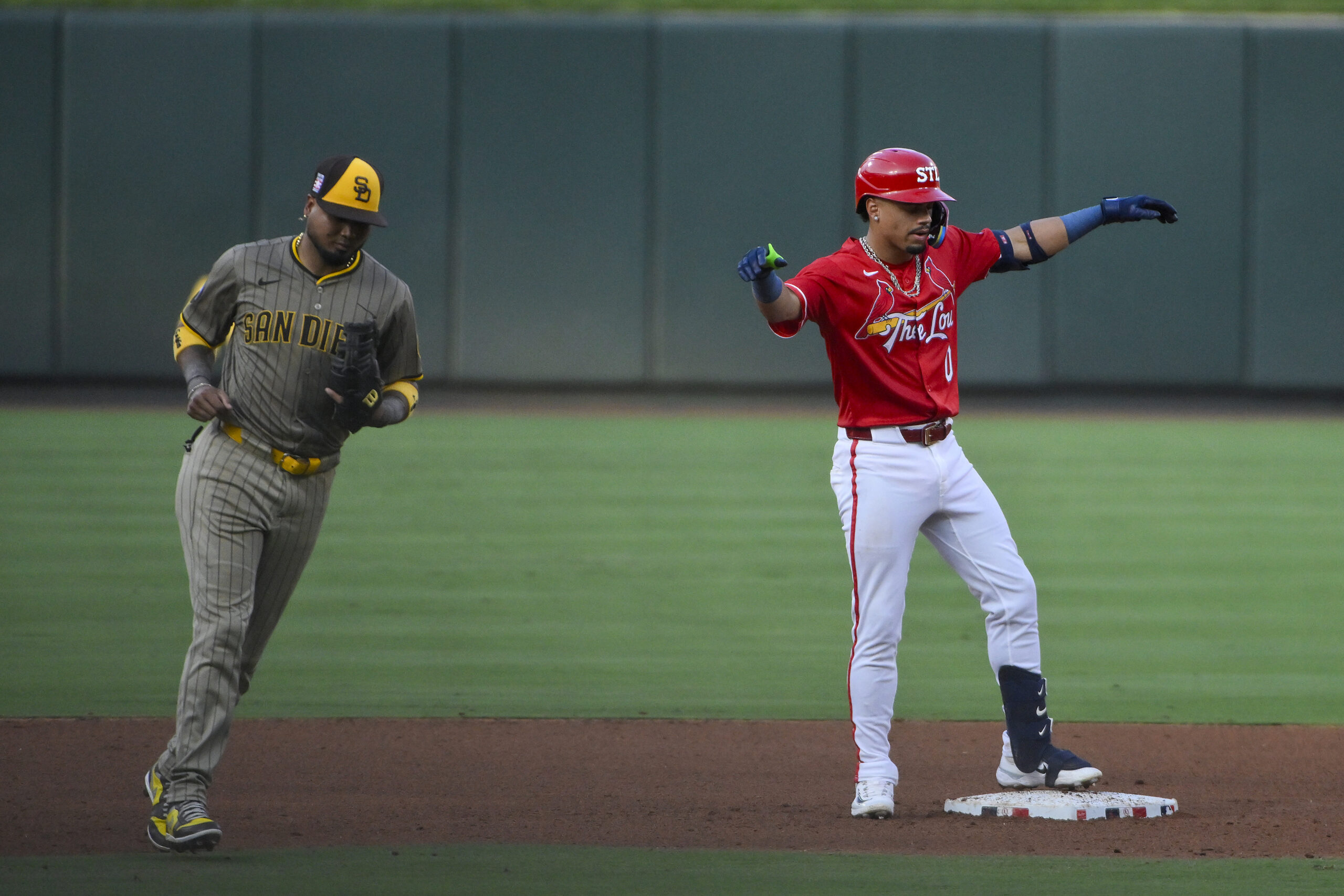 Jul 25, 2025; St. Louis, Missouri, USA; St. Louis Cardinals shortstop Masyn Winn (0) reacts after hitting a two run double against the San Diego Padres during the fourth inning at Busch Stadium. Mandatory Credit: Jeff Curry-Imagn Images