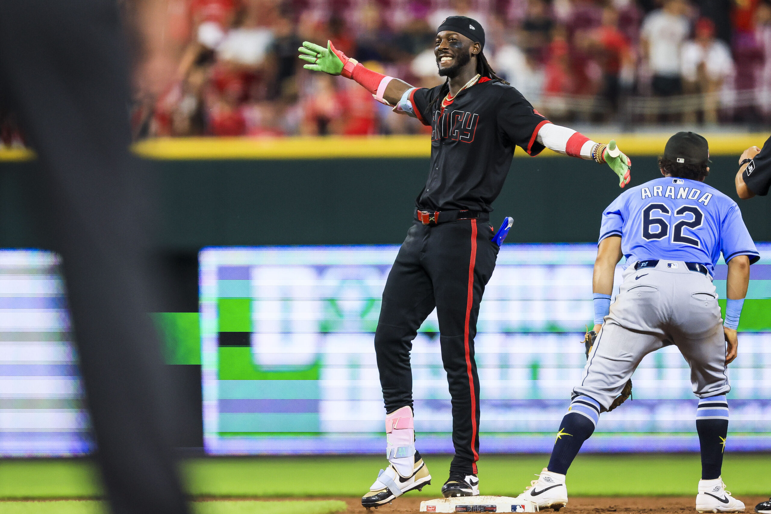 Jul 25, 2025; Cincinnati, Ohio, USA; Cincinnati Reds shortstop Elly De La Cruz (44) reacts after hitting a double in the eighth inning against the Tampa Bay Rays at Great American Ball Park. Mandatory Credit: Katie Stratman-Imagn Images