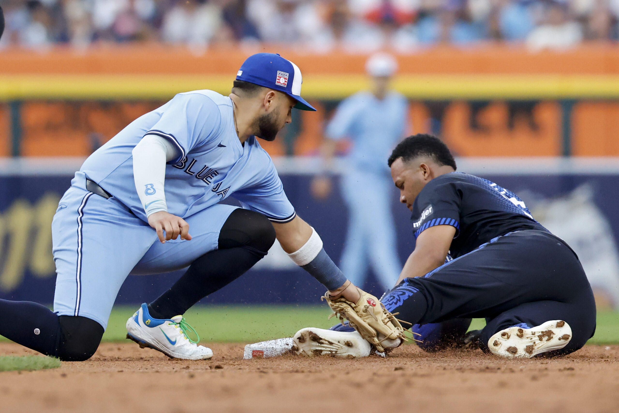 Jul 25, 2025; Detroit, Michigan, USA;  Detroit Tigers outfielder Wenceel Perez (46) steals second ahead of Toronto Blue Jays shortstop Bo Bichette (11) in the second inning at Comerica Park. Mandatory Credit: Rick Osentoski-Imagn Images