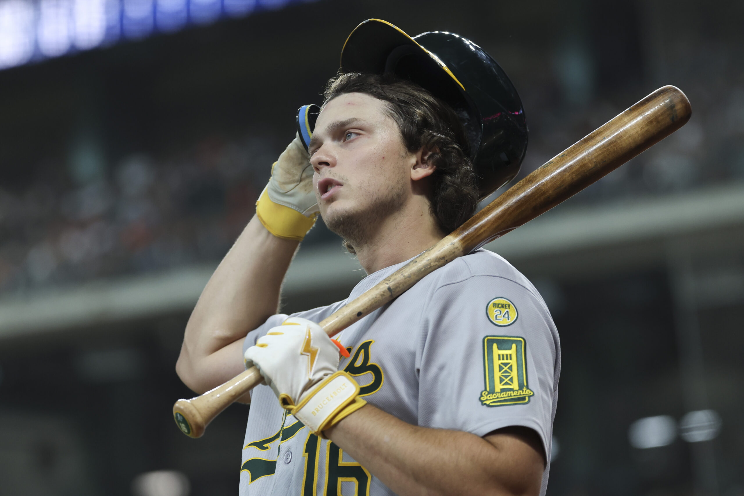 Jul 26, 2025; Houston, Texas, USA; Athletics first baseman Nick Kurtz (16) stands on deck during the third inning against the Houston Astros at Daikin Park. Mandatory Credit: Troy Taormina-Imagn Images