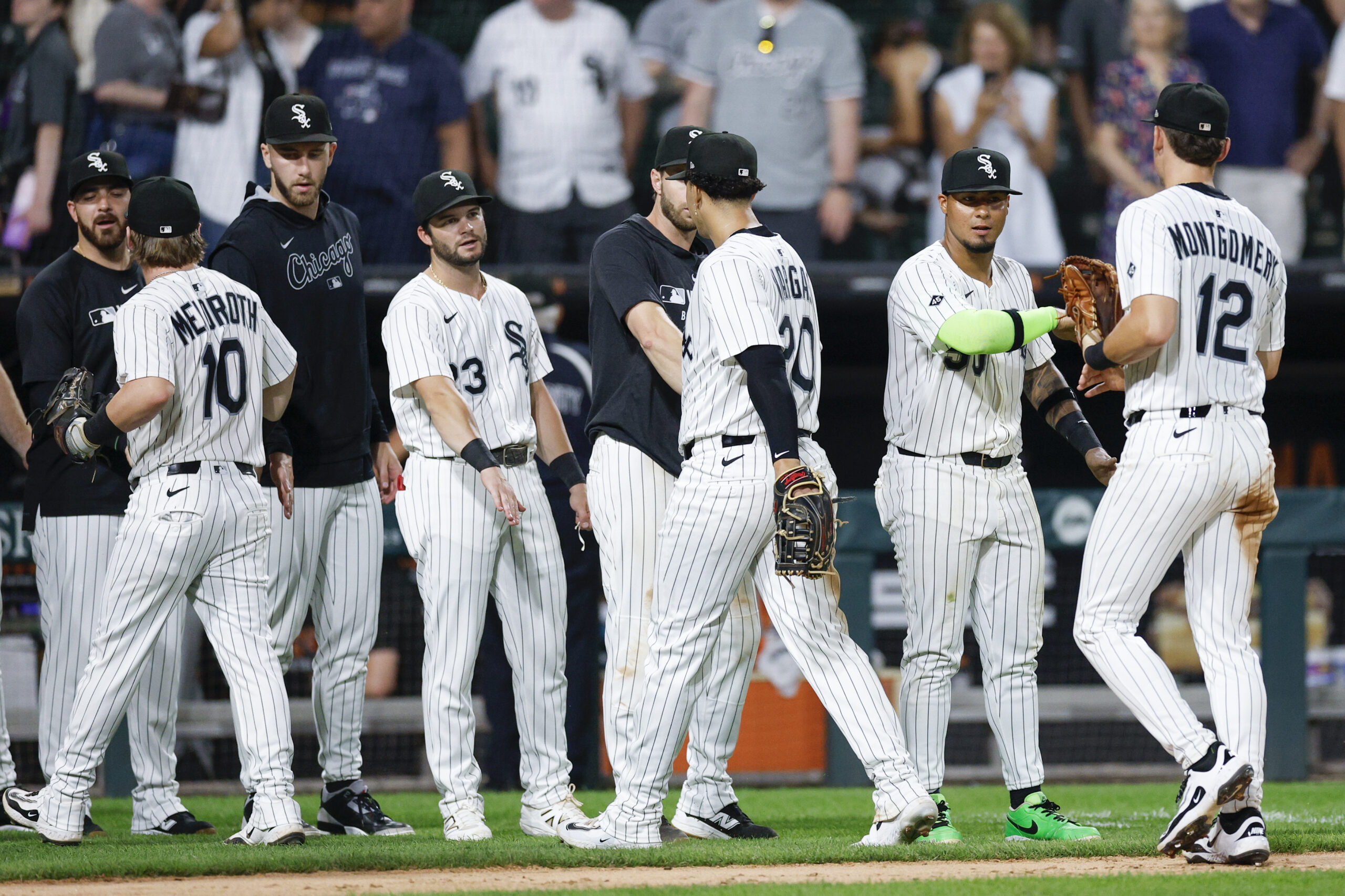 Jul 28, 2025; Chicago, Illinois, USA; Chicago White Sox players celebrate team's win against the Philadelphia Phillies at Rate Field. Mandatory Credit: Kamil Krzaczynski-Imagn Images