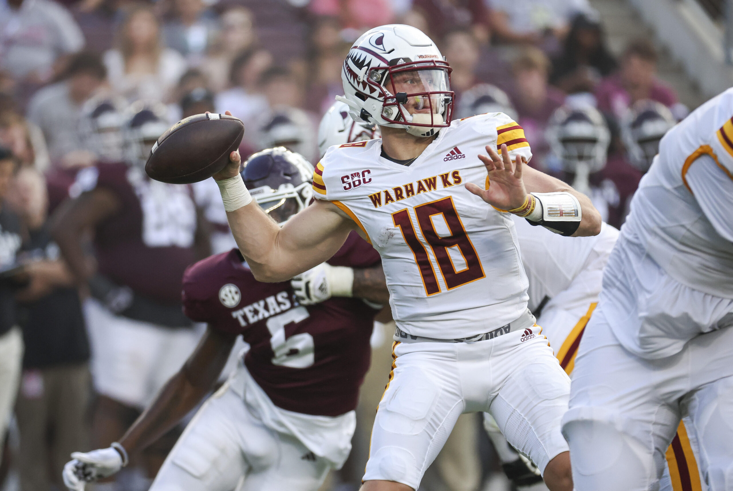 Sep 16, 2023; College Station, Texas, USA; Louisiana Monroe Warhawks quarterback Jiya Wright (18) attempts a pass during the third quarter against the Texas A&M Aggies at Kyle Field. Mandatory Credit: Troy Taormina-Imagn Images
