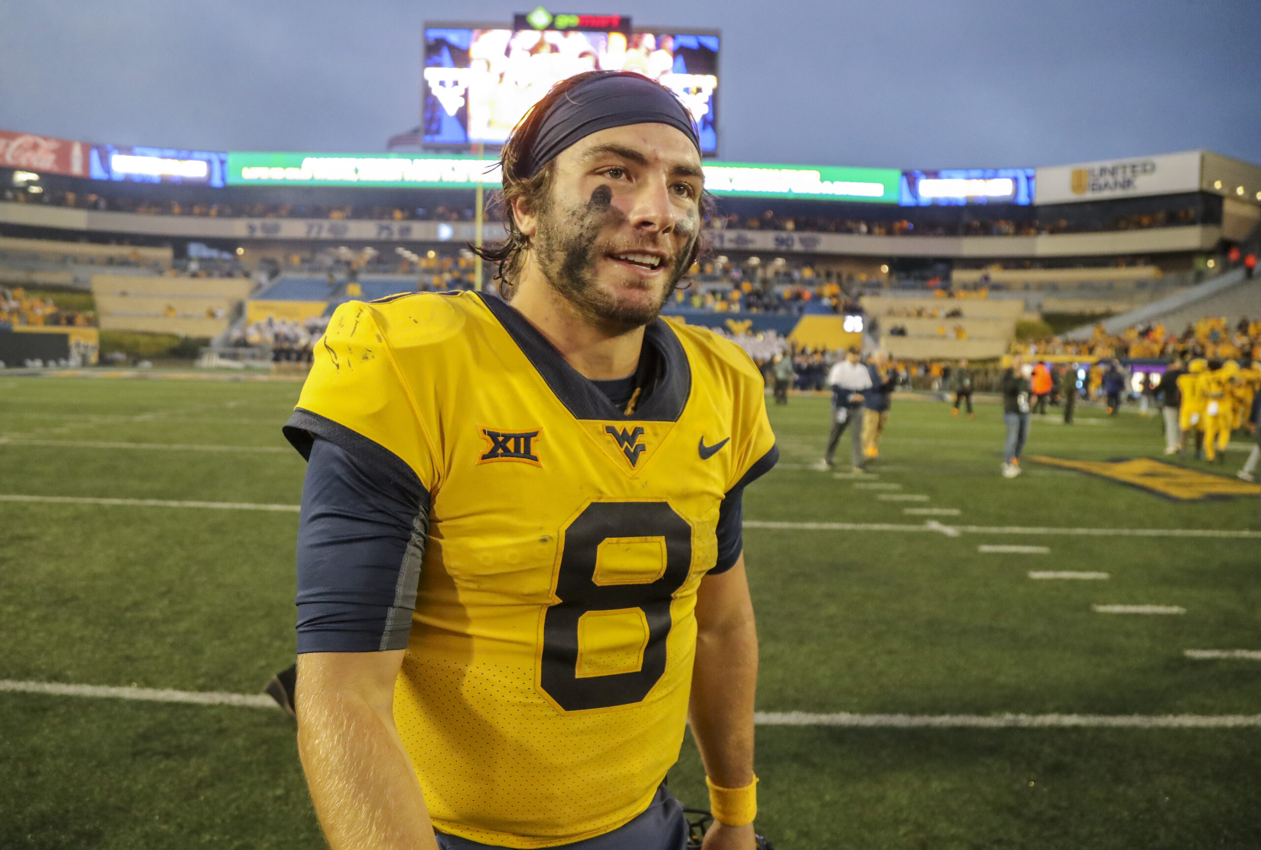 Sep 23, 2023; Morgantown, West Virginia, USA; West Virginia Mountaineers quarterback Nicco Marchiol (8) celebrates after defeating the Texas Tech Red Raiders at Mountaineer Field at Milan Puskar Stadium. Mandatory Credit: Ben Queen-Imagn Images
