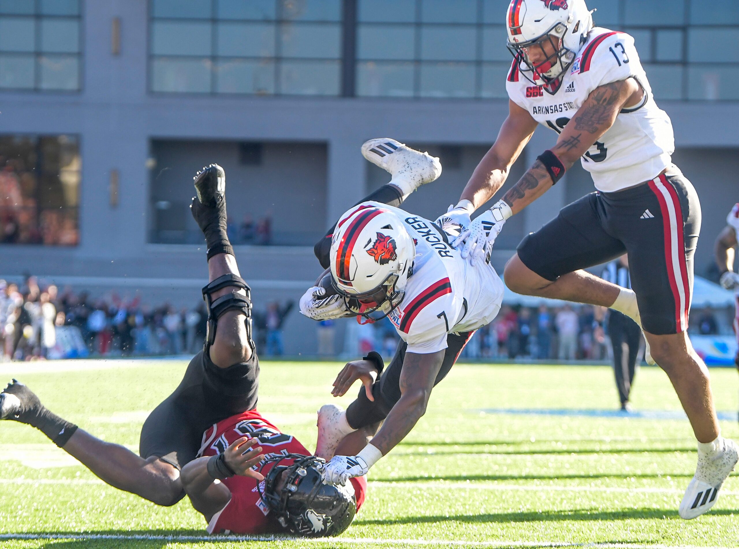 Arkansas State Red Wolves wide receiver Corey Rucker (7) scores a tate touchdown against the Northern Illinois Huskies in the Camellia Bowl at Cramton Bowl in Montgomery, Ala., on Saturday December 23, 2023.