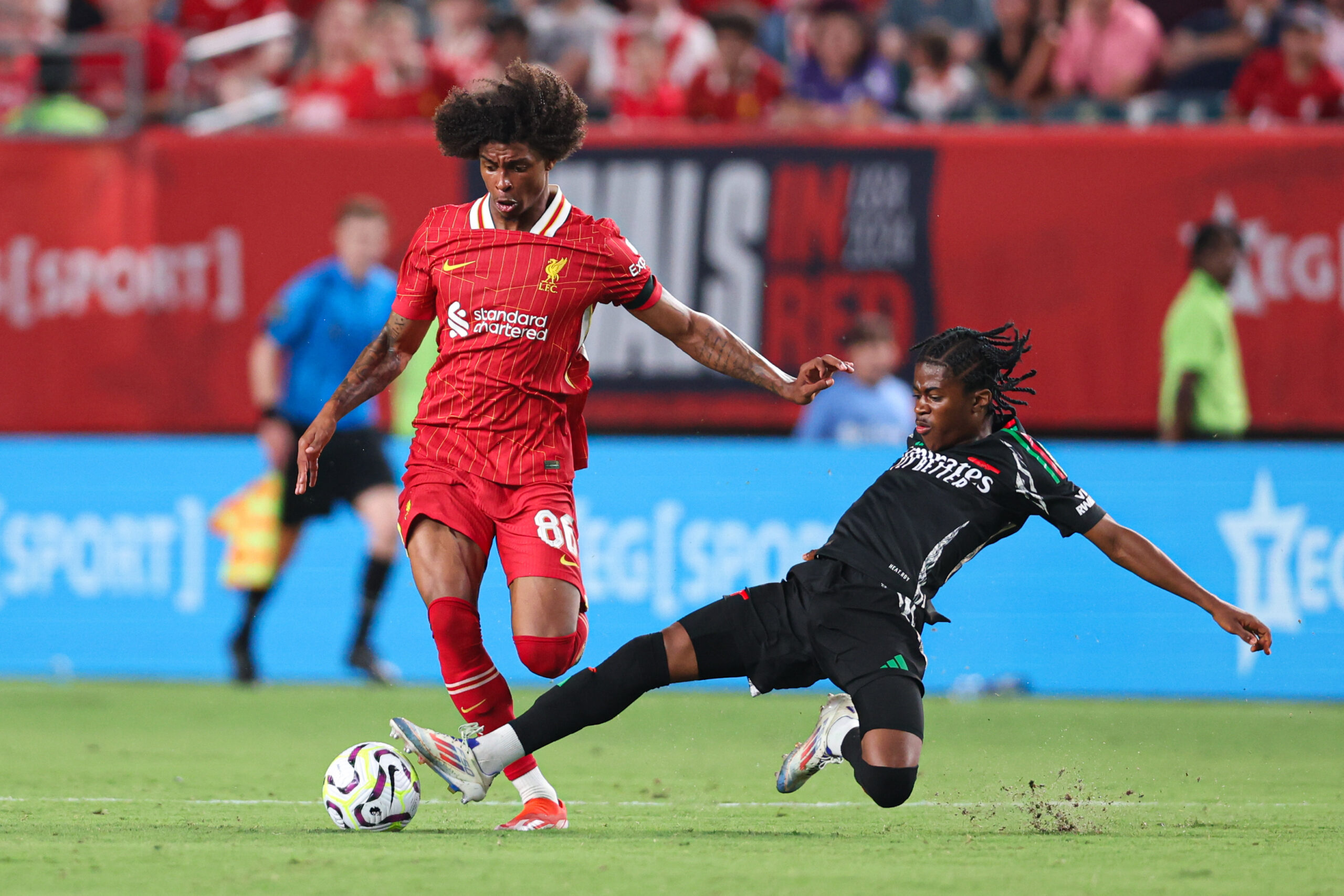 Jul 31, 2024; Philadelphia, PA, USA; Arsenal midfielder Josh Nichols (51) tackles the ball from Liverpool forward Harvey Blair (86) during the second half at Lincoln Financial Field. Mandatory Credit: Bill Streicher-Imagn Images