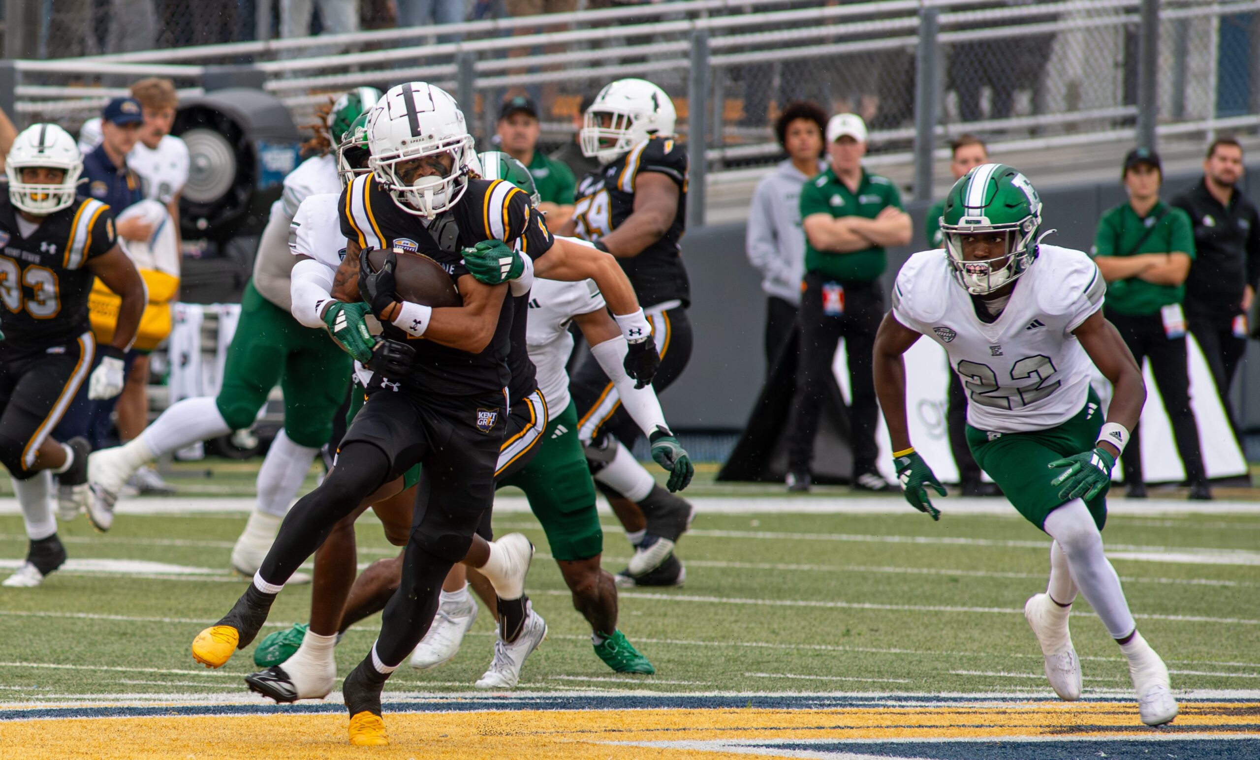 Kent State wide receiver Chrishon McCray is tackled by Eastern Michigan after receiving a pass during the game against Eastern Michigan, Saturday, Sept. 28, 2024.