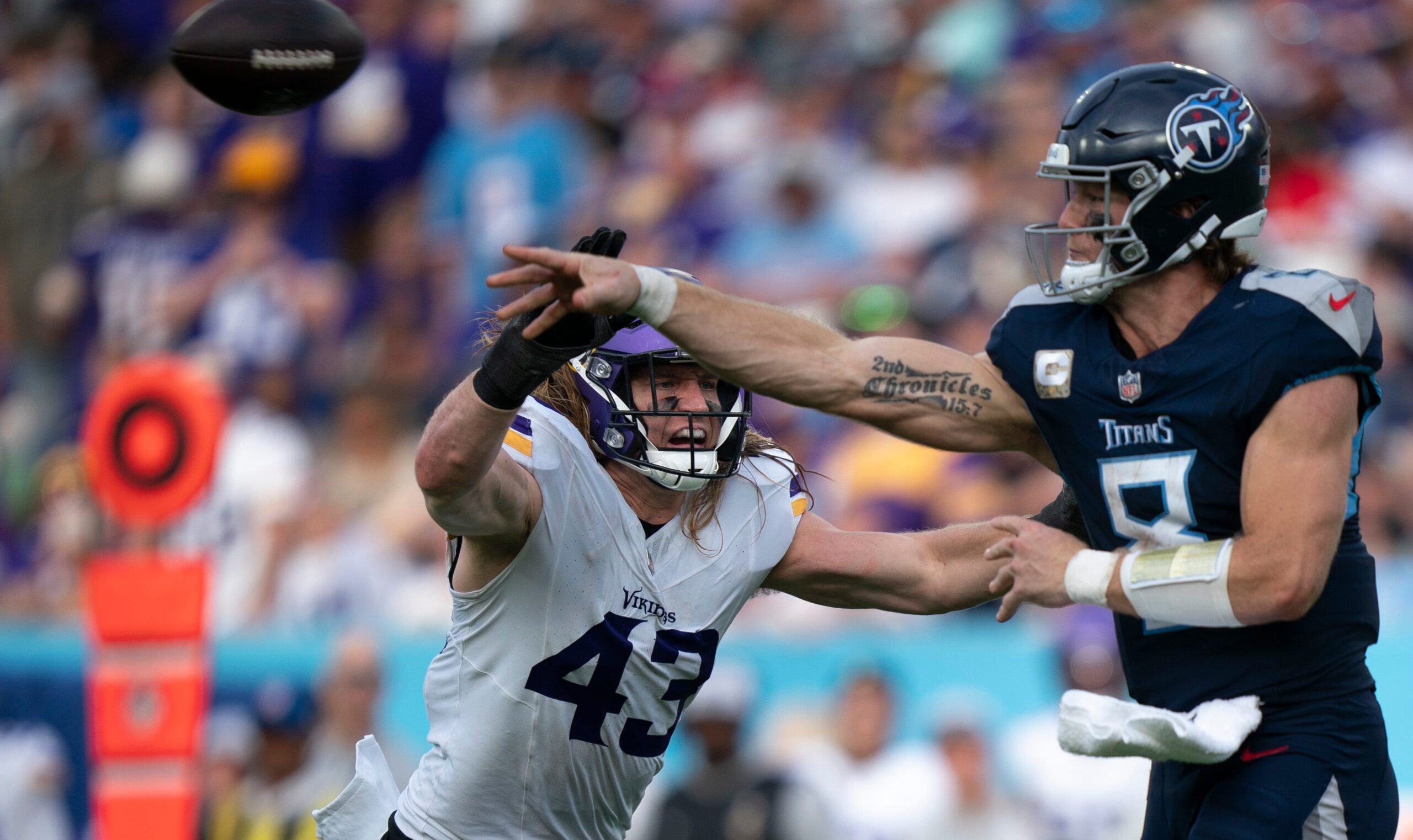 Minnesota Vikings linebacker Andrew Van Ginkel (43) pressures Tennessee Titans quarterback Will Levis (8) on a throw in the second half at Nissan Stadium in Nashville, Tenn., Sunday, Nov. 17, 2024.